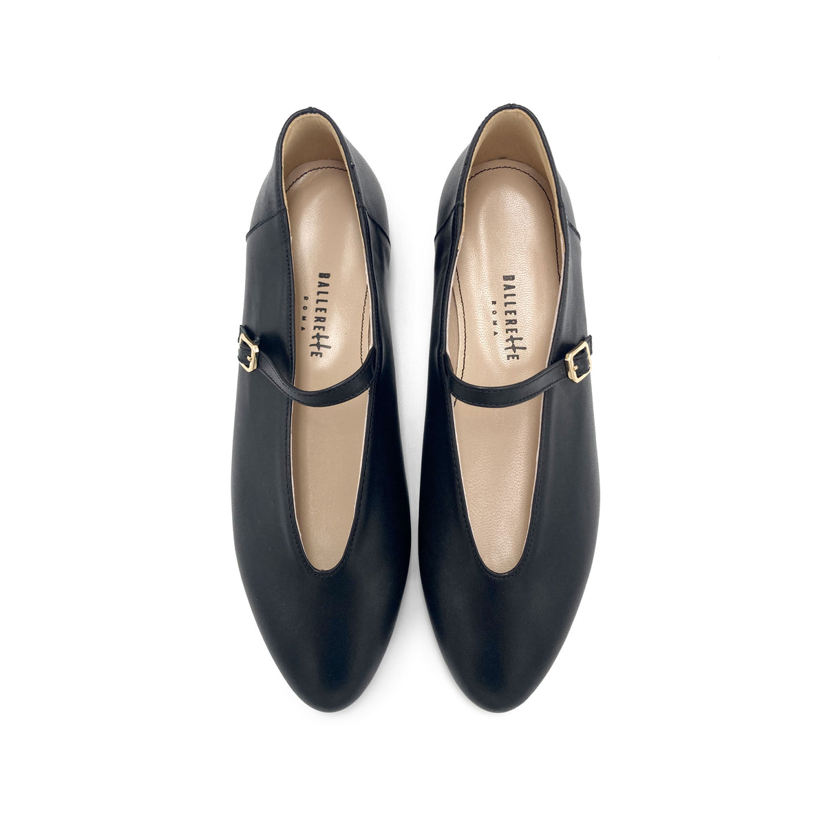 Black leather ballet flats with V-cut and strap