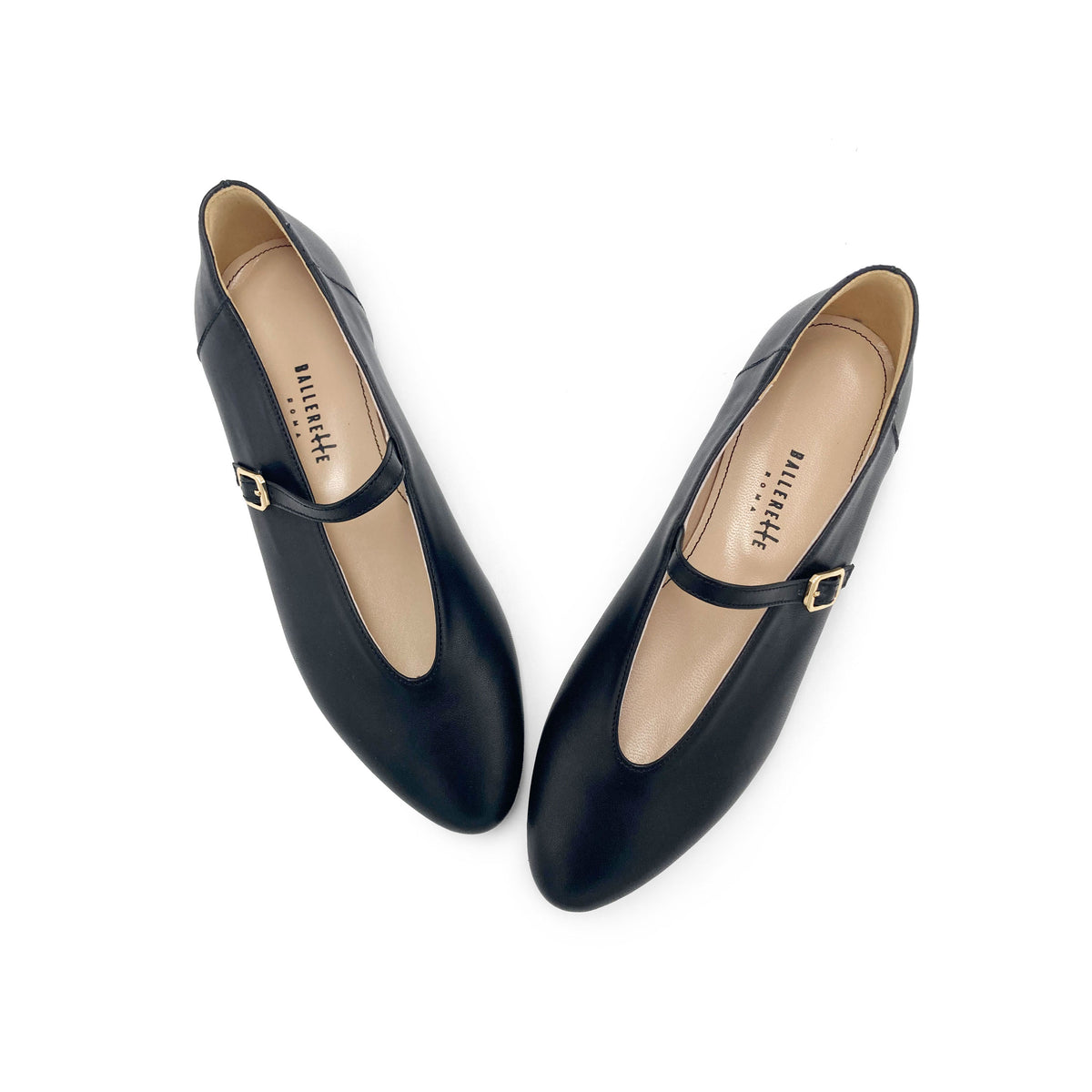 Black leather ballet flats with V-cut and strap