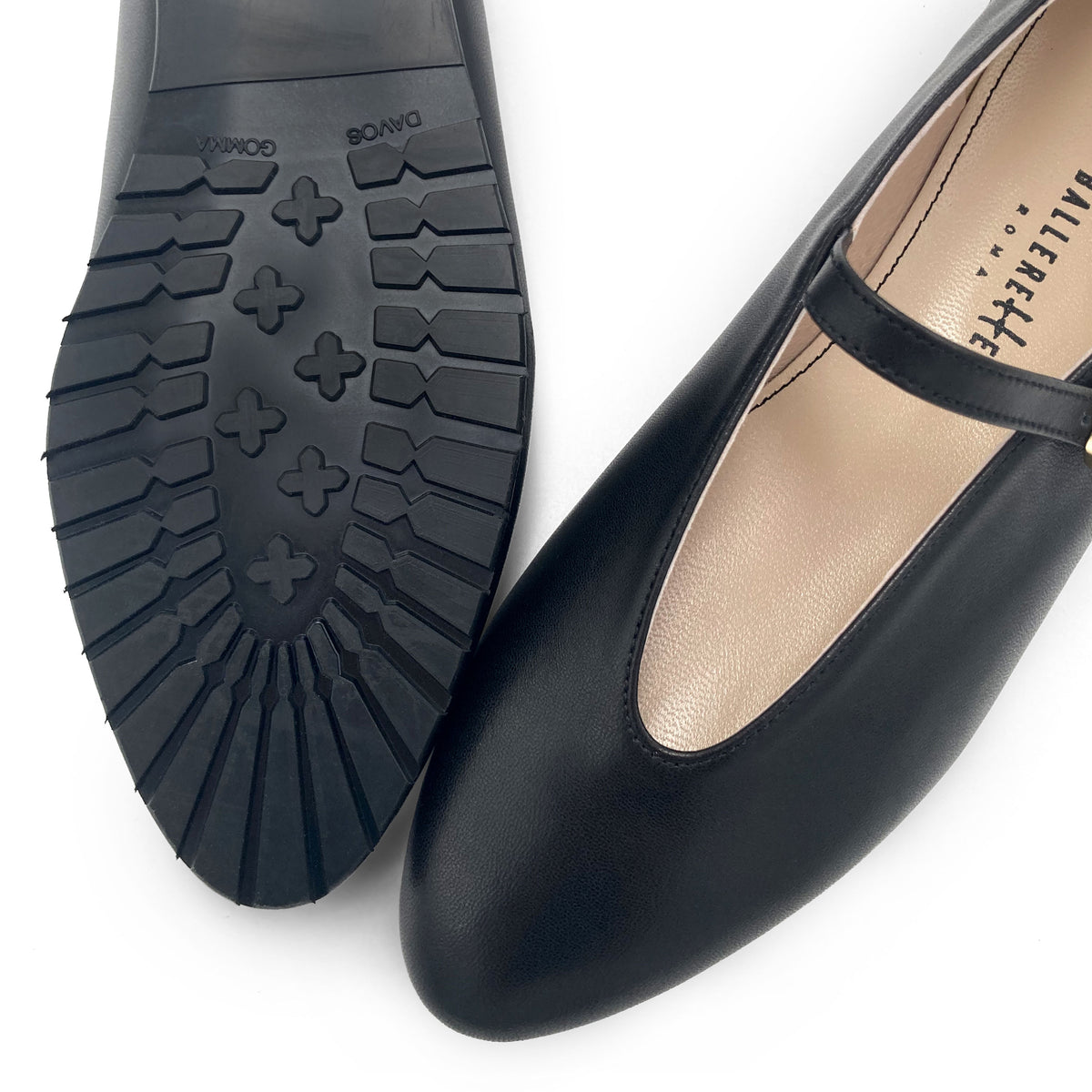 Black leather ballet flats with V-cut and strap