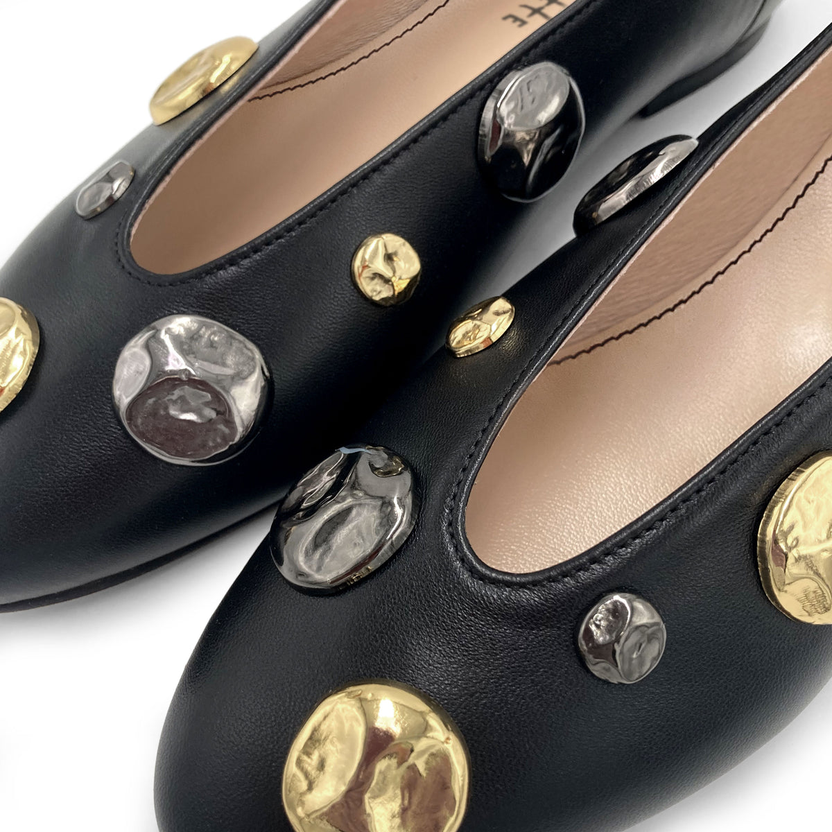 Black leather high shoe-vamp flats with gold and iron studs