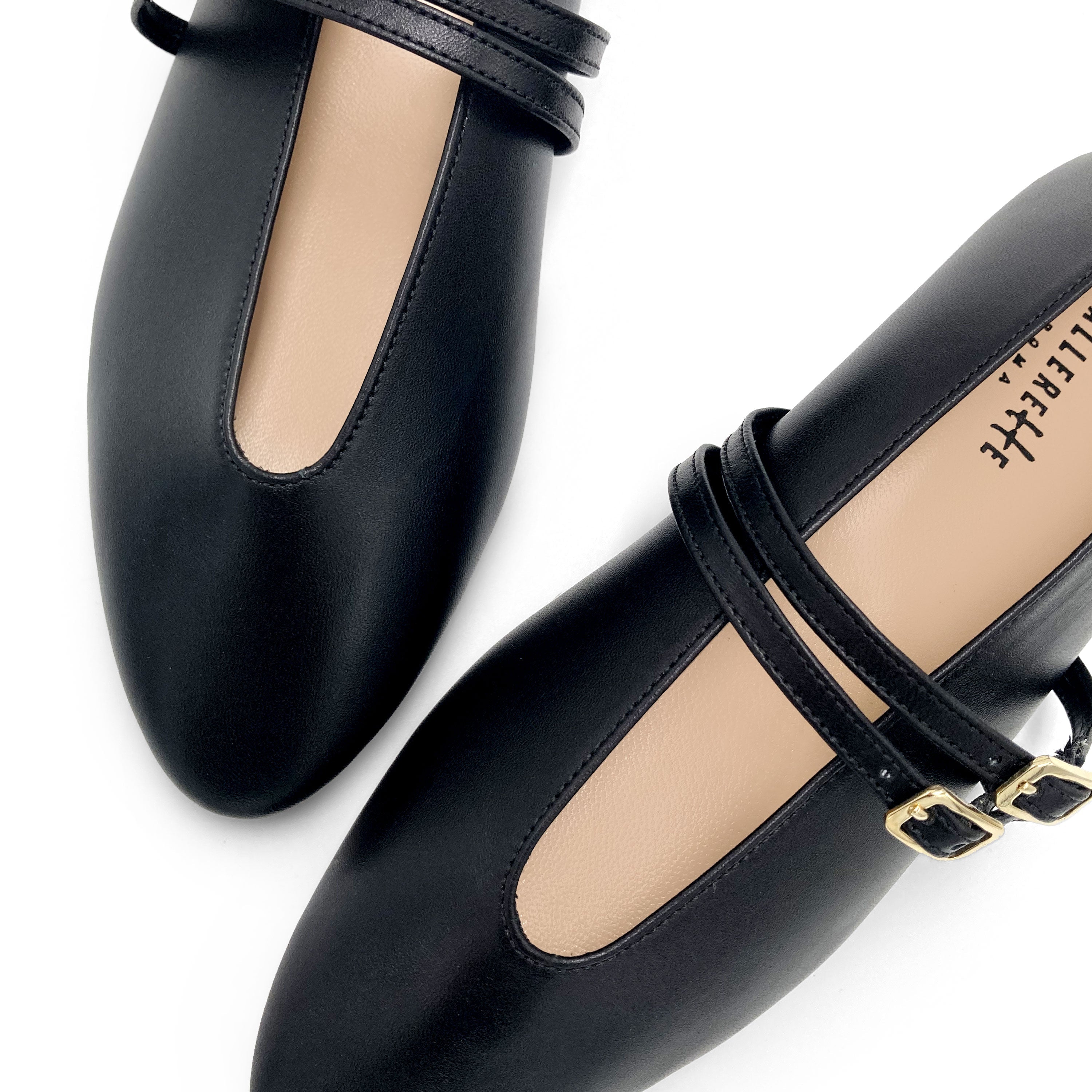 Black leather ballet flats with V cut and straps