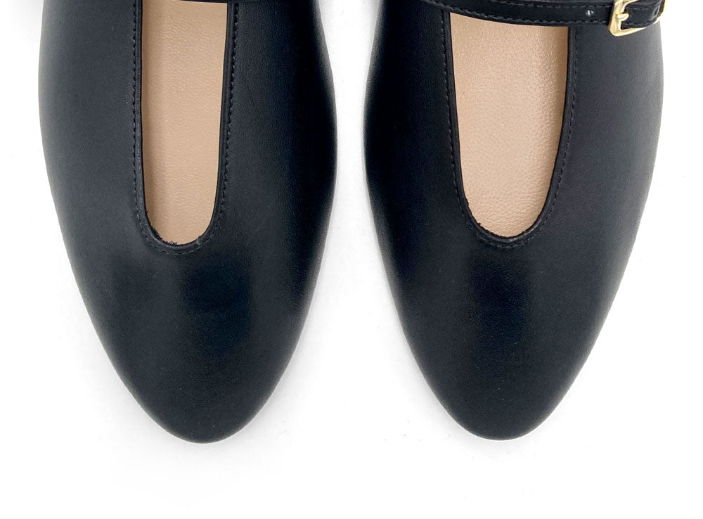 Black leather ballet flats with V cut and straps