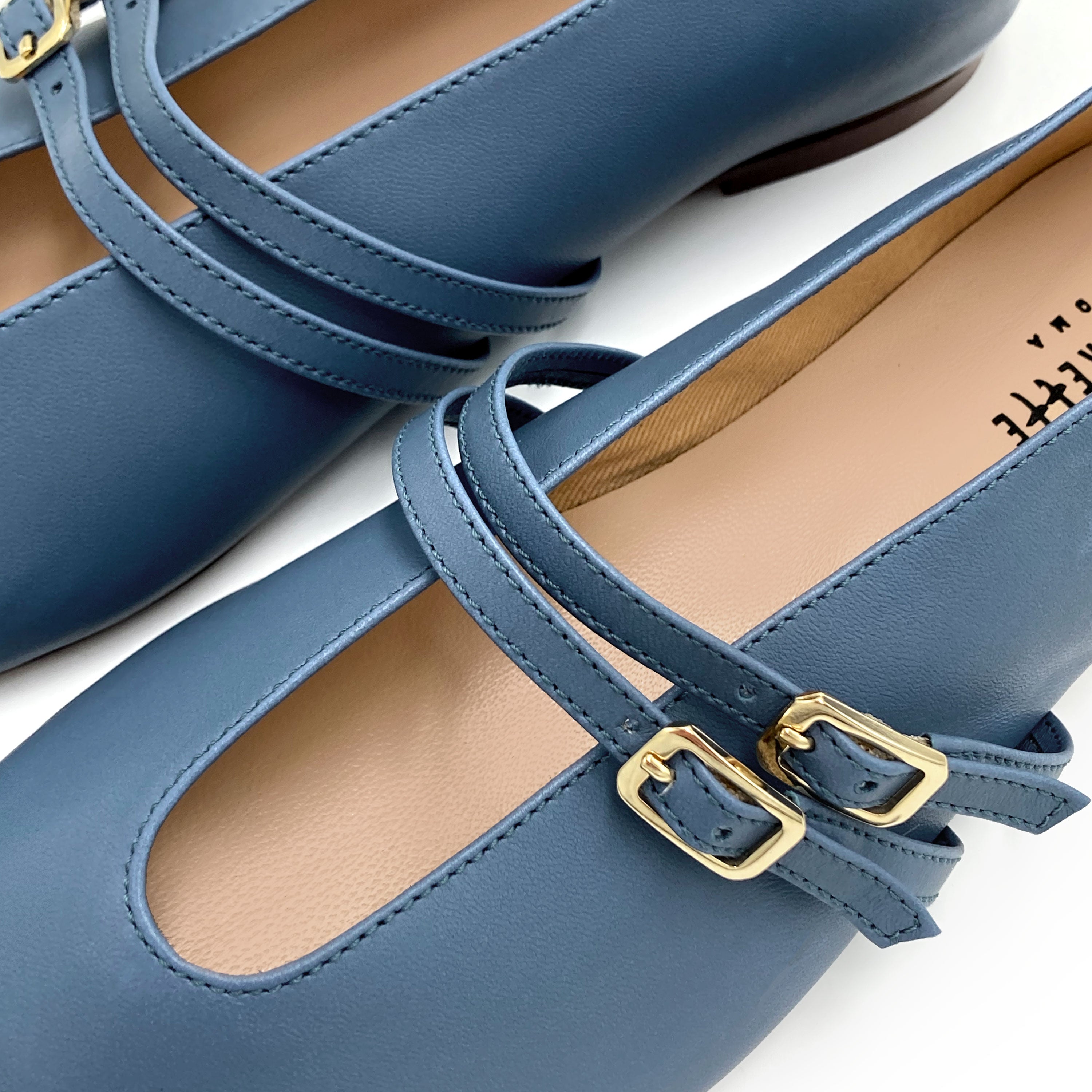 Cerulean blue leather ballet flats with V cut and straps