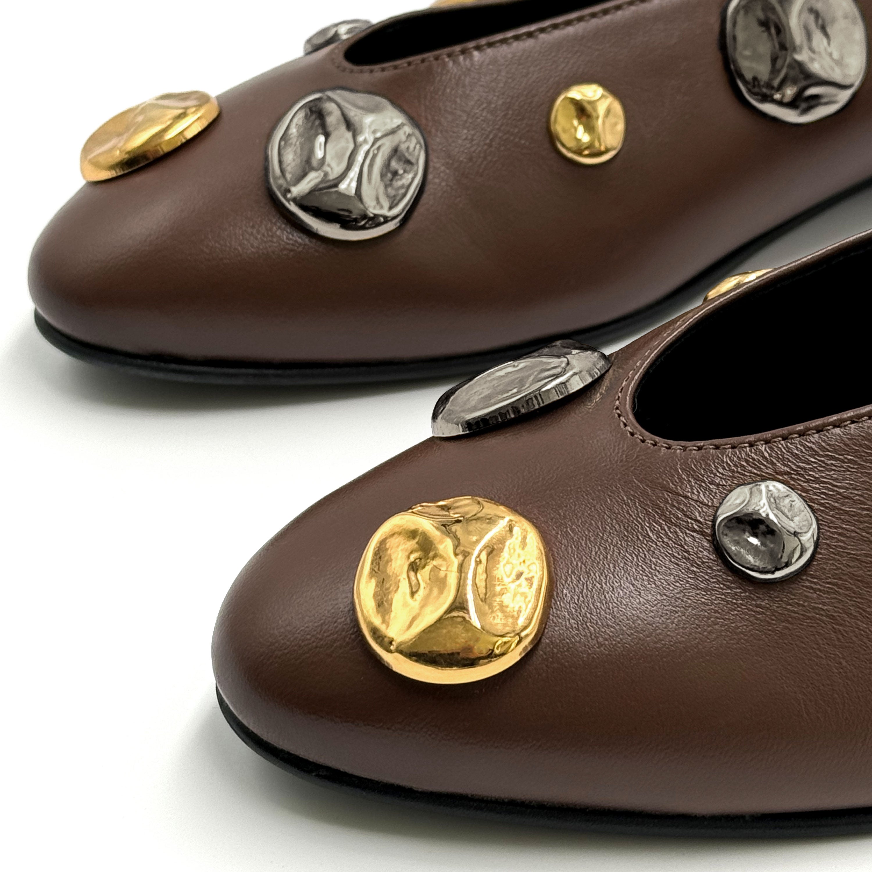 Brown leather ballet flats with V-cut and gold and iron studs