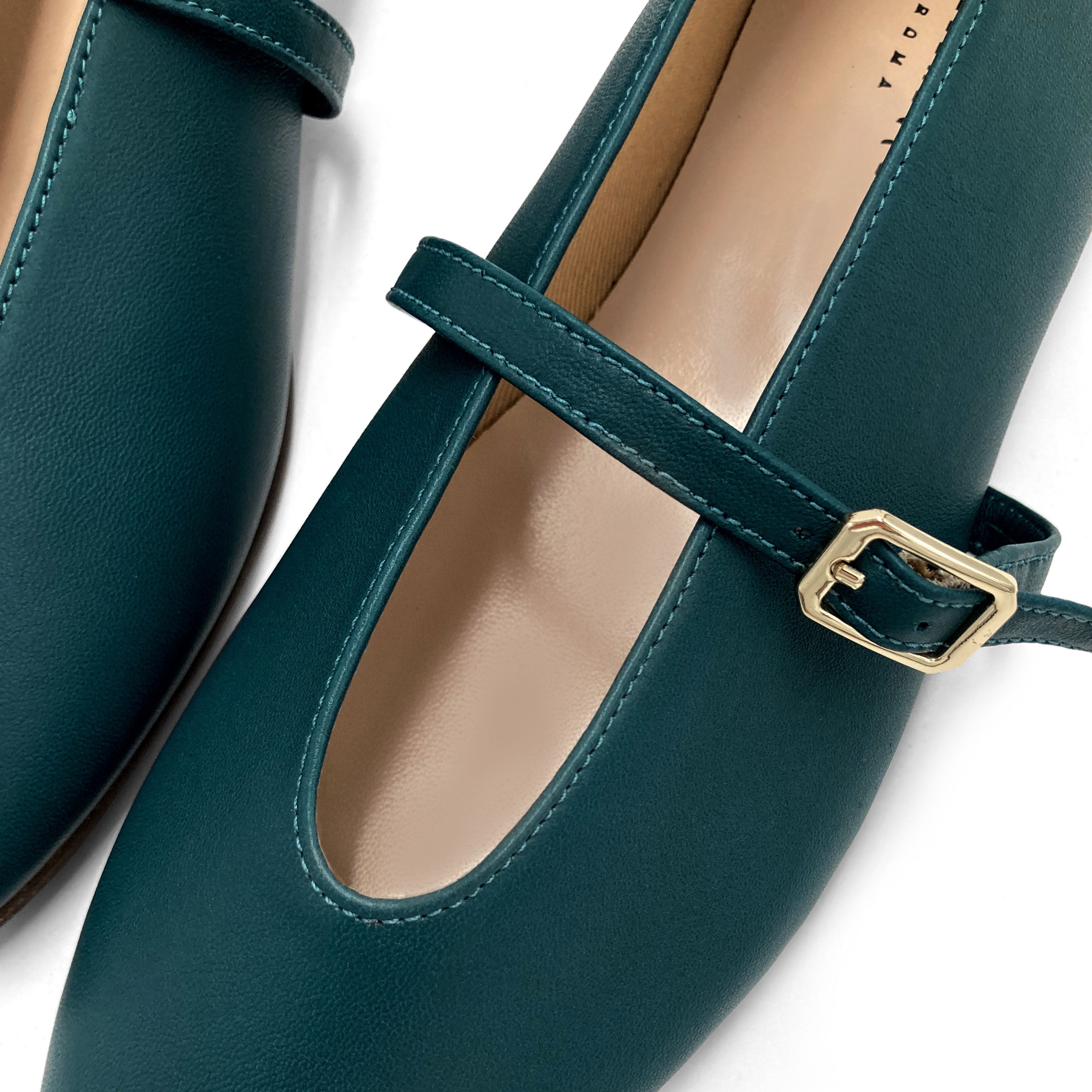 Petrol blue leather ballet flats with V-cut and strap