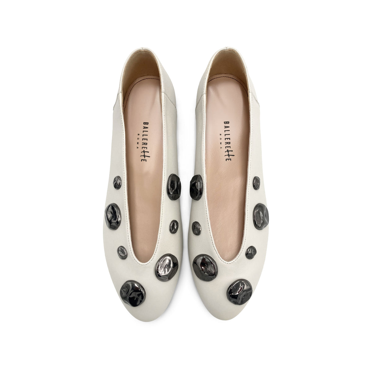 Ivory white leather ballet flats with V-cut and iron studs