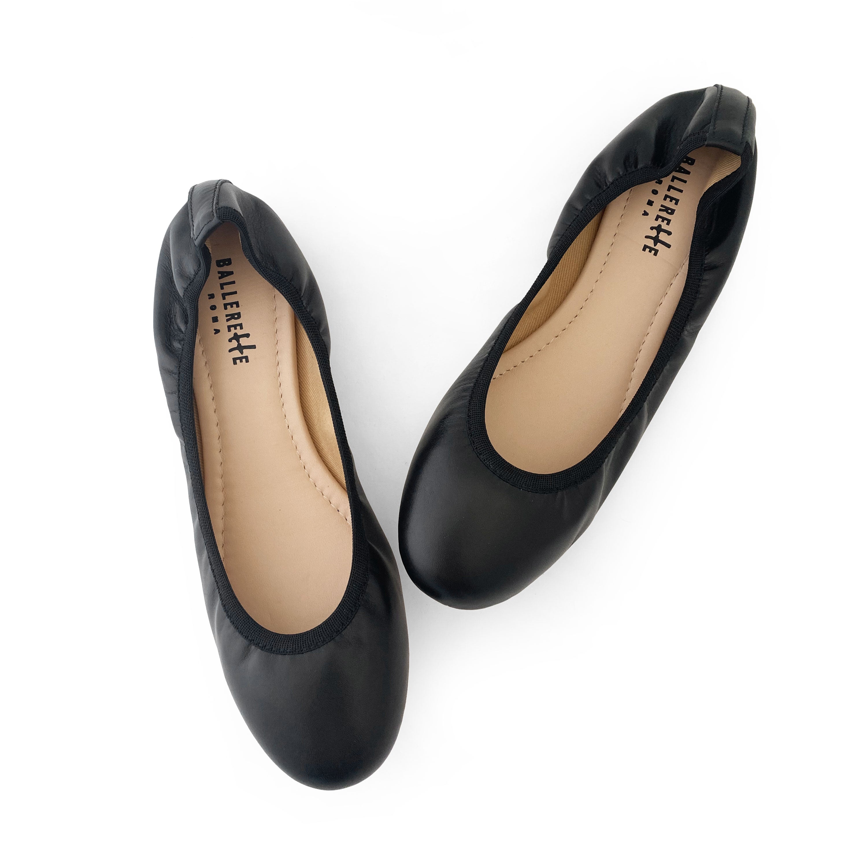 Black ballet flats with elastic