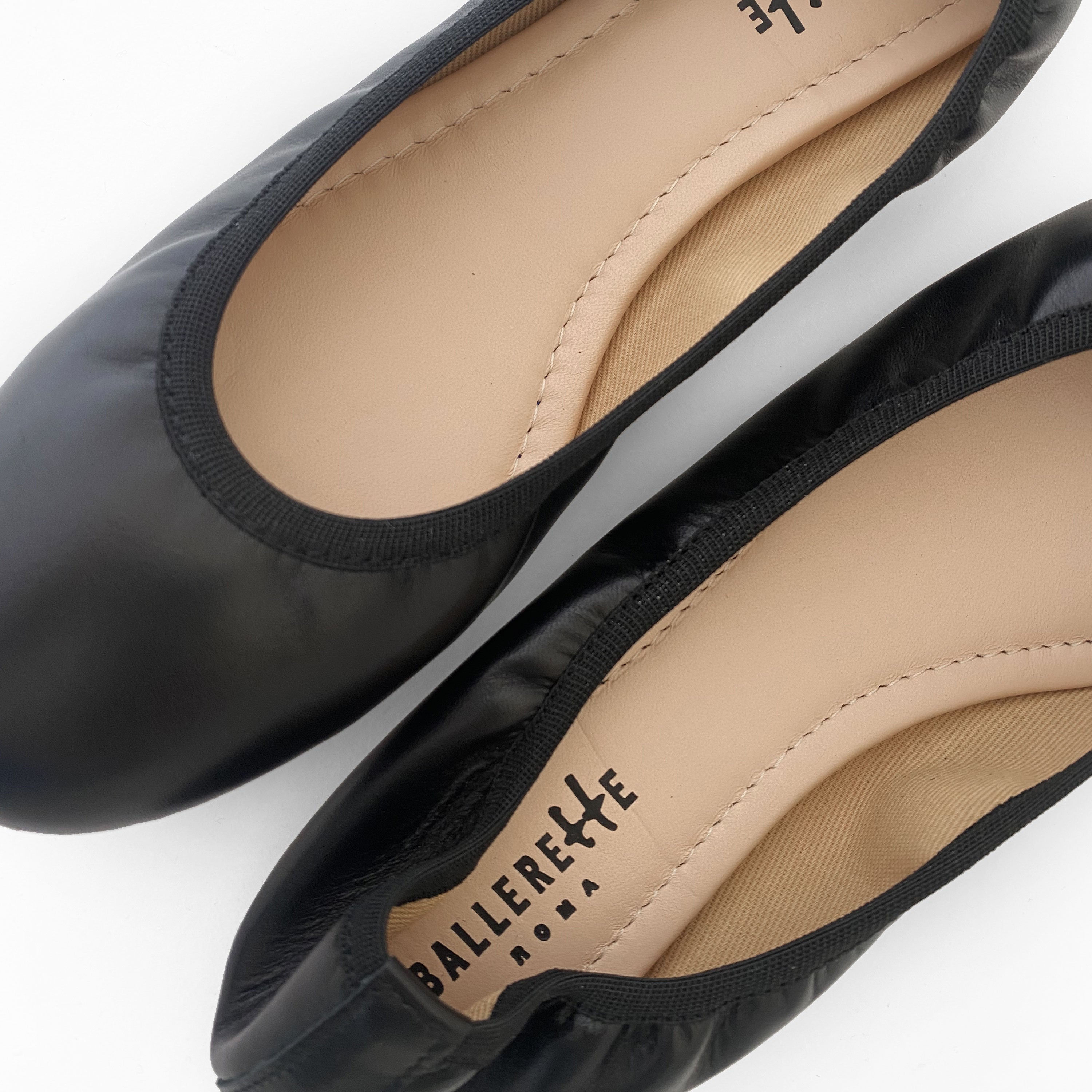 Black ballet flats with elastic