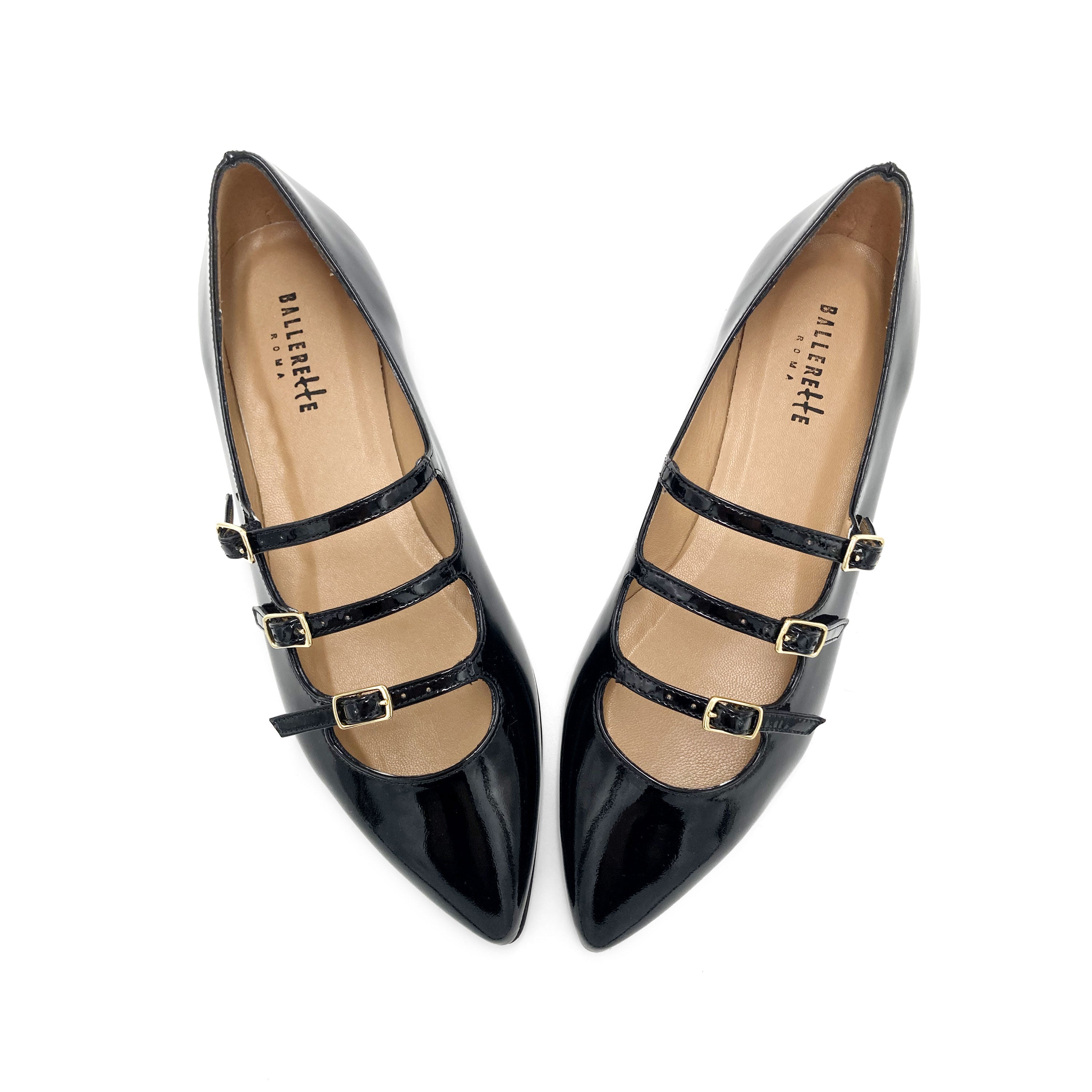 Black shiny pointed ballet flats with three straps