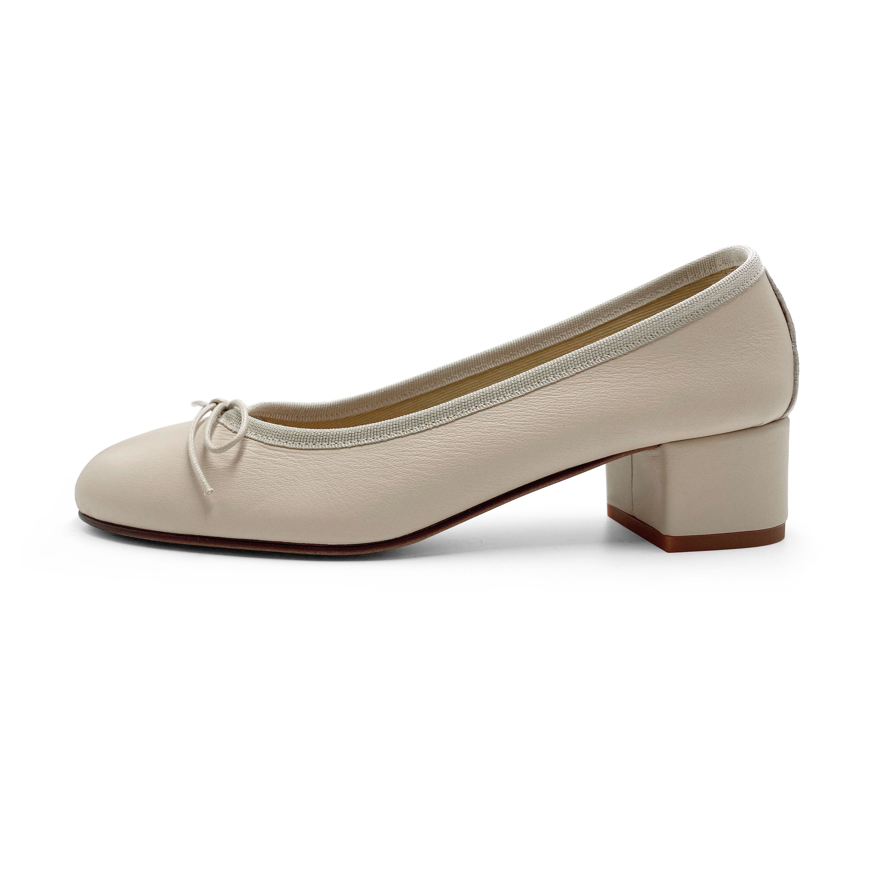 Beige leather ballet flats with heel