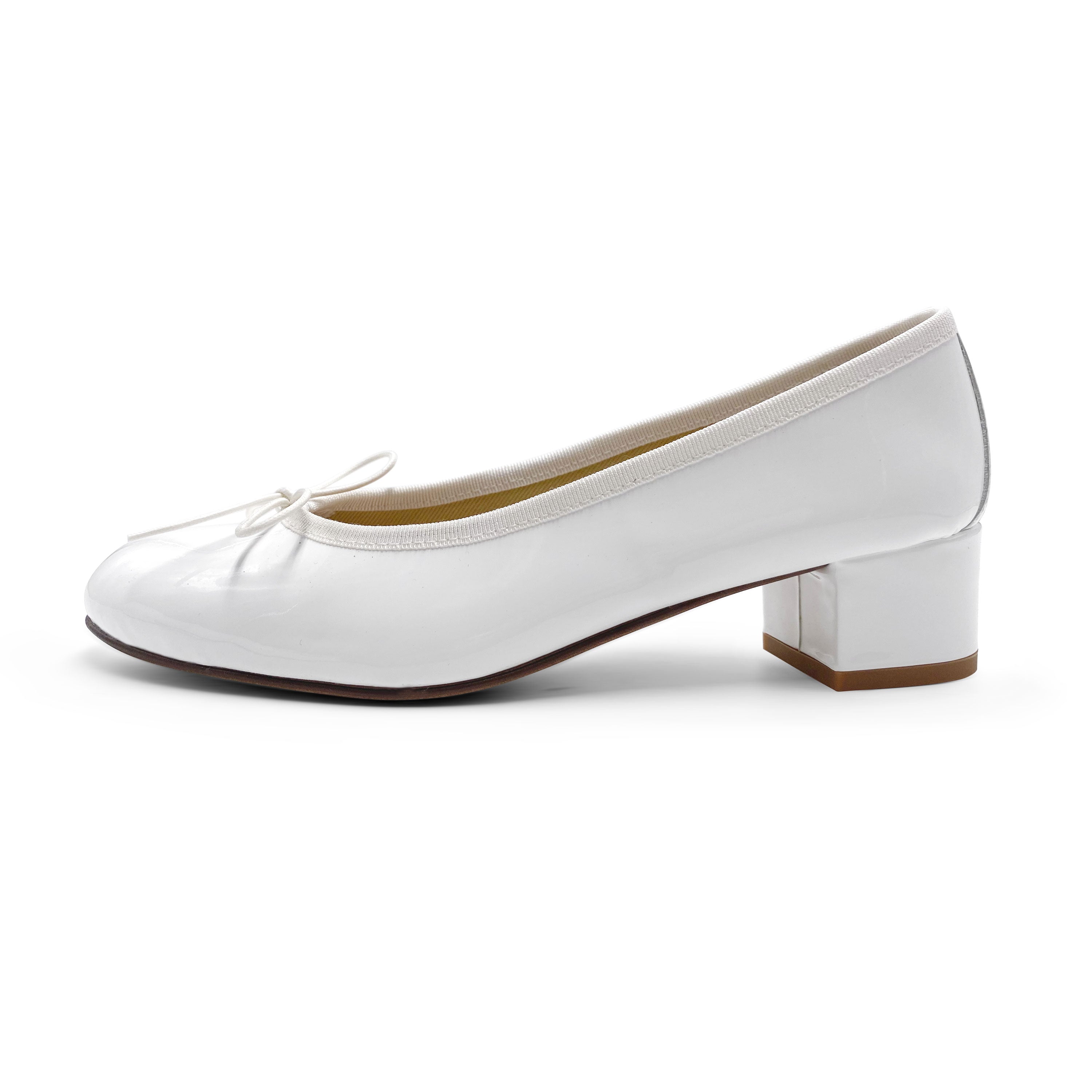 White patent ballerinas with high heels