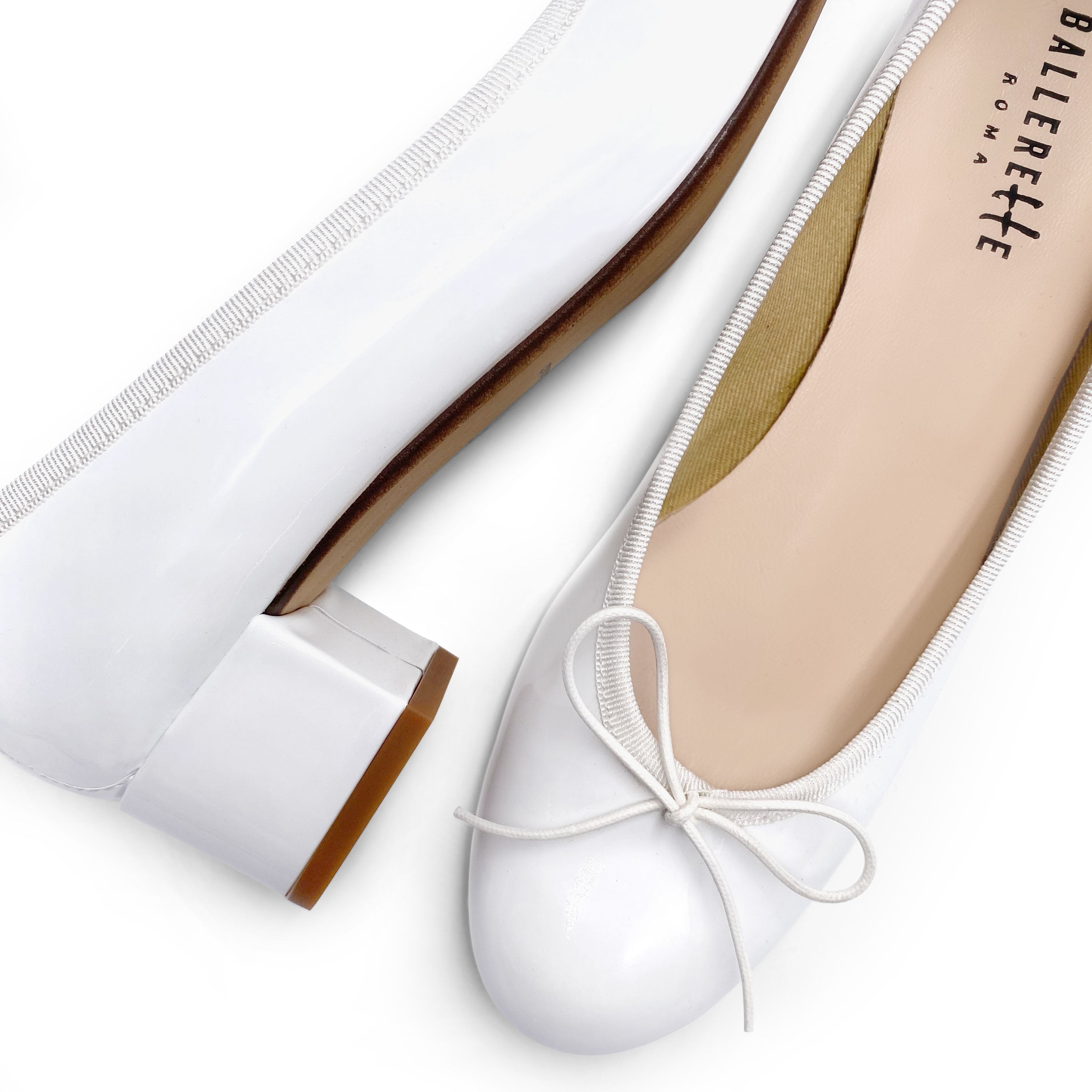 White patent ballerinas with high heels