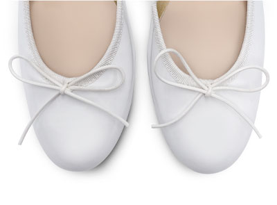 White patent ballerinas with high heels