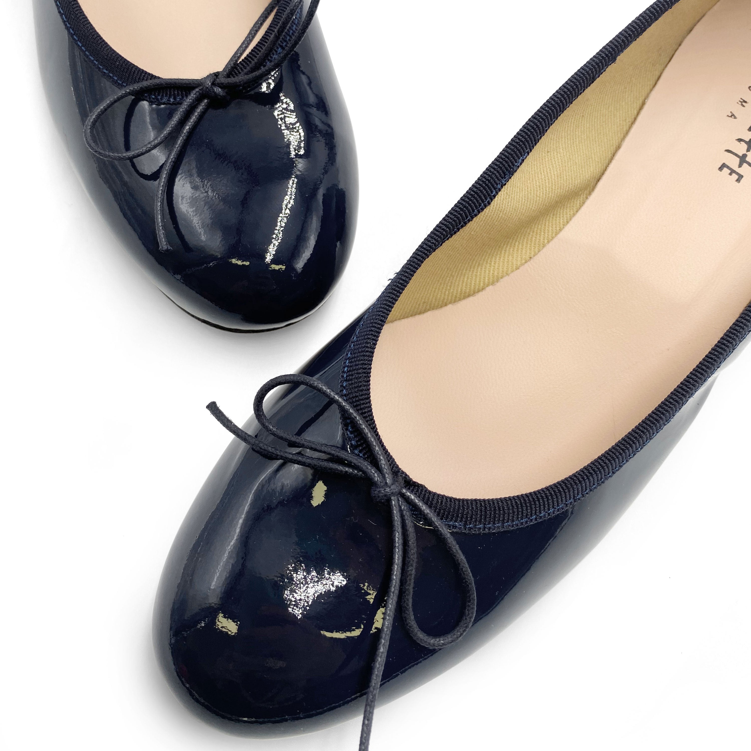 Blue patent leather ballet flats with heel