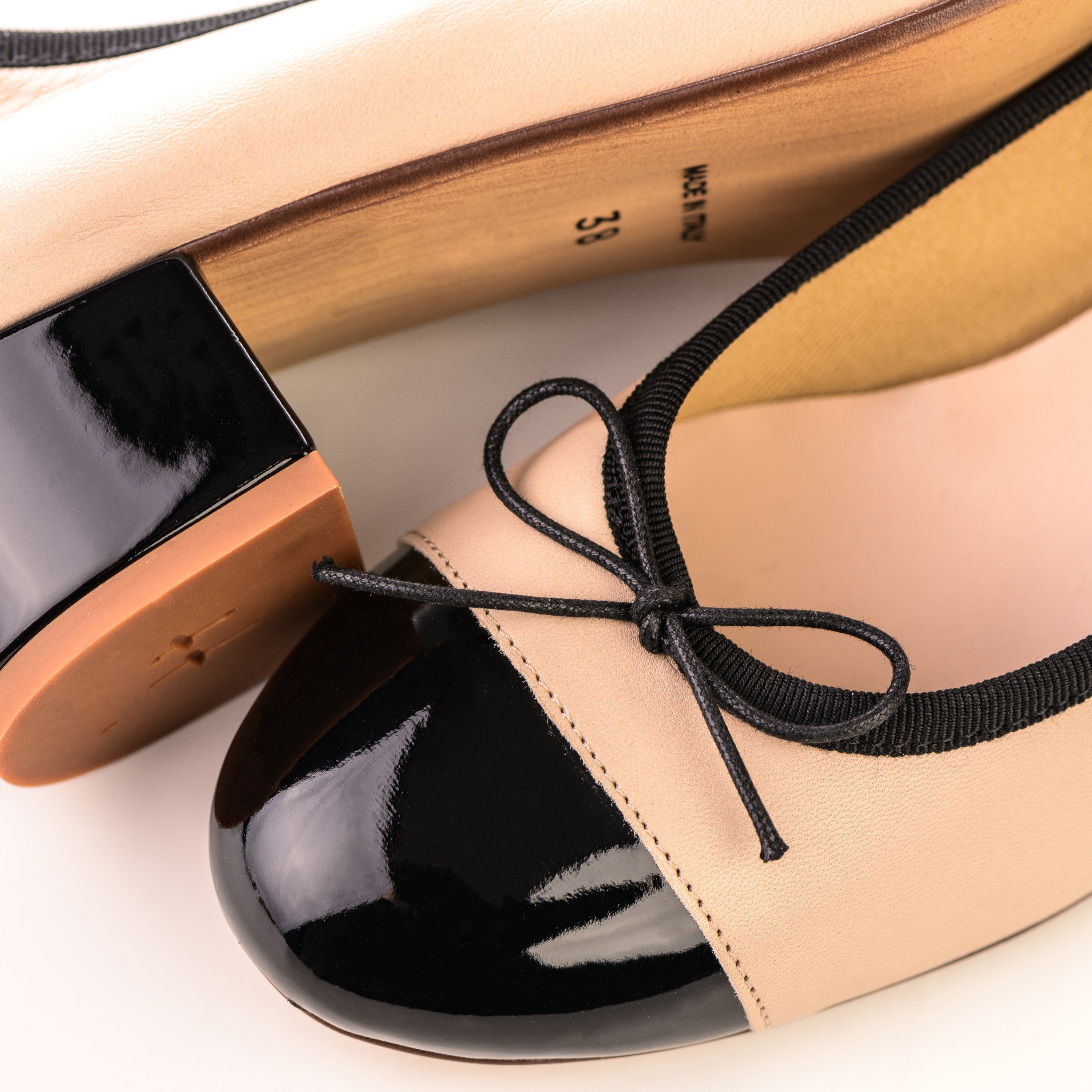 Powder pink leather ballet flats with high heel and patent toe