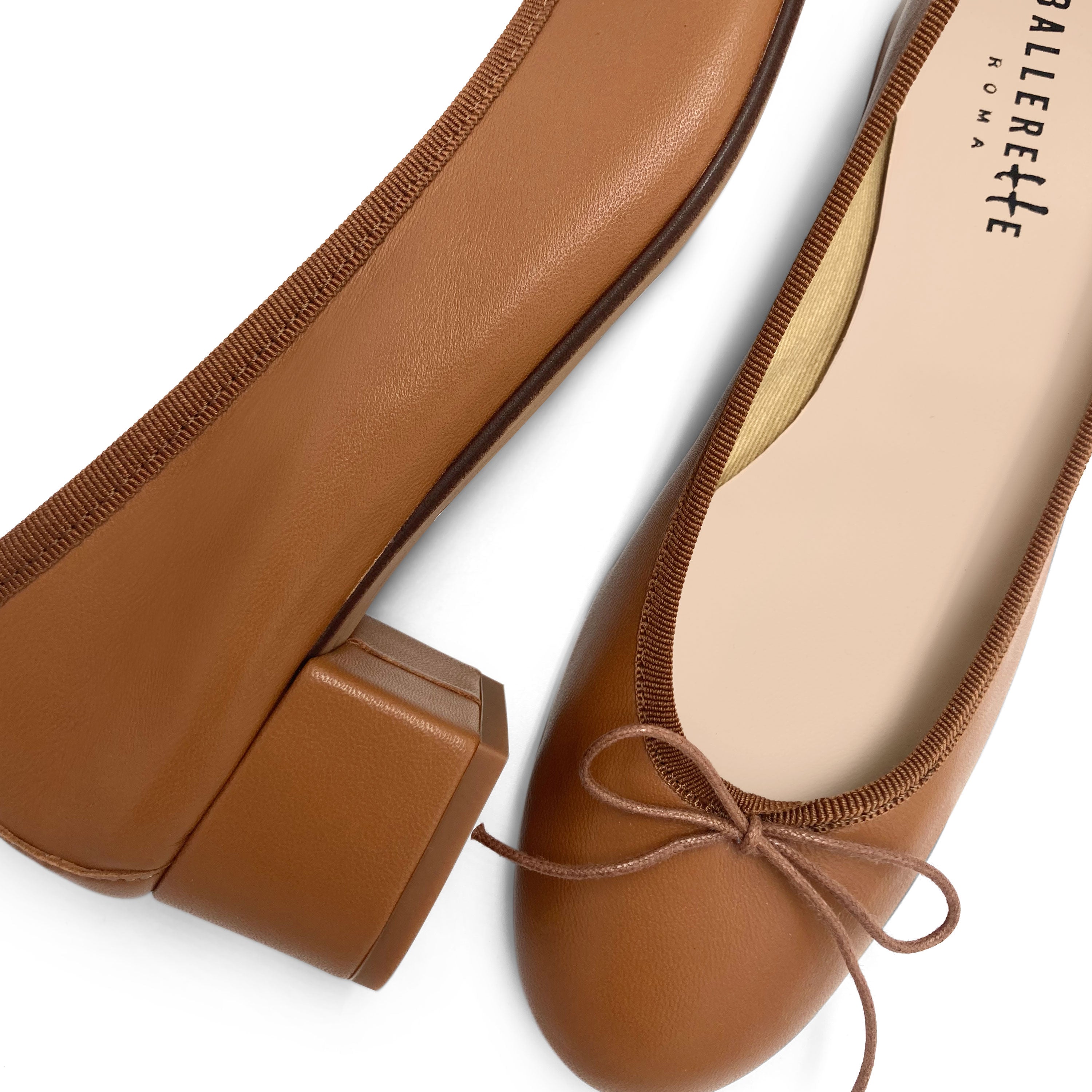 Tan leather ballet flats with heel