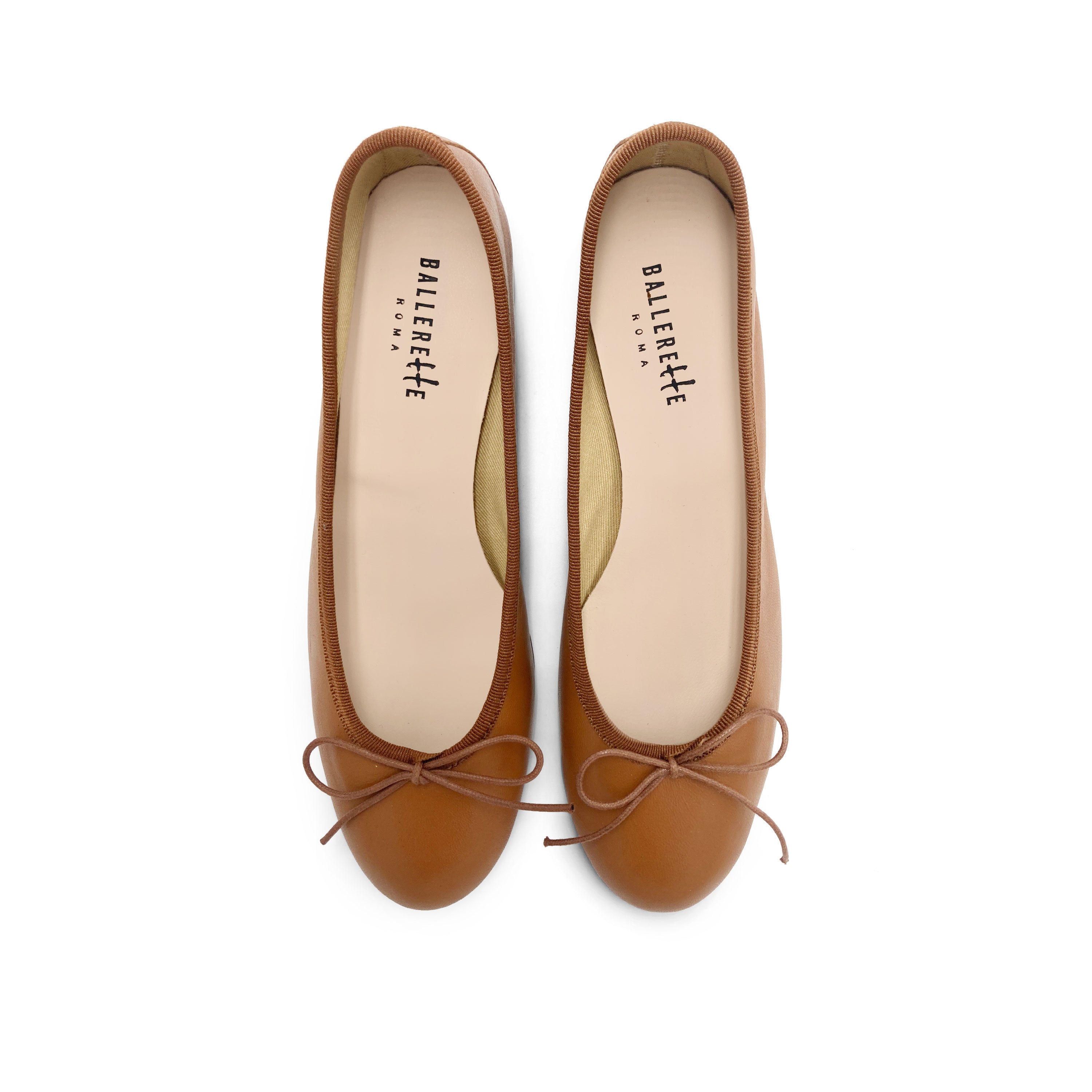 Tan leather ballet flats with heel