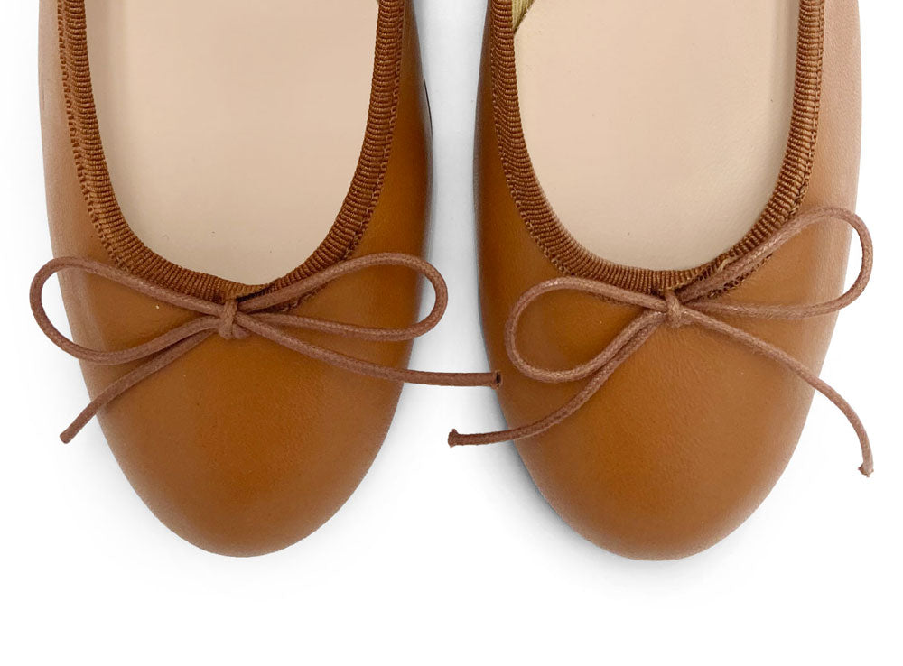 Tan leather ballet flats with heel