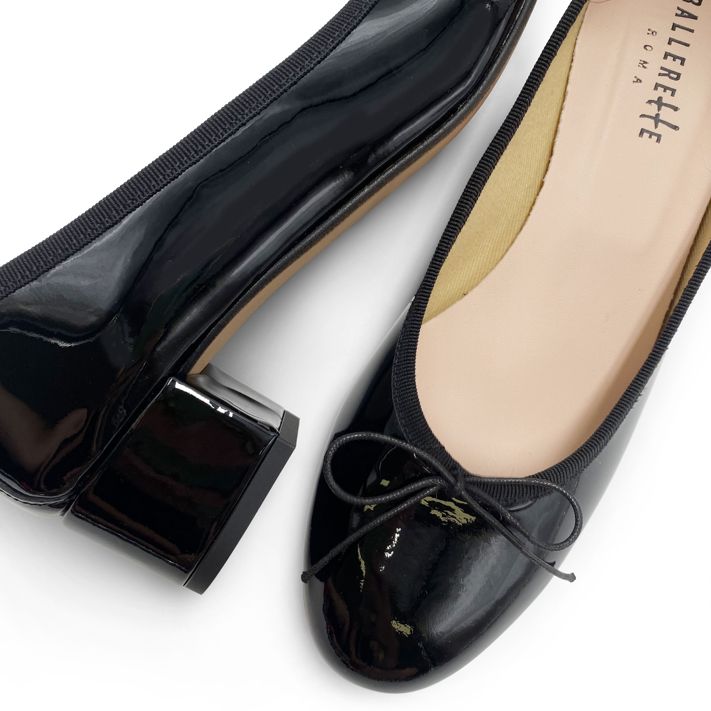 Black patent leather ballet flats with heel