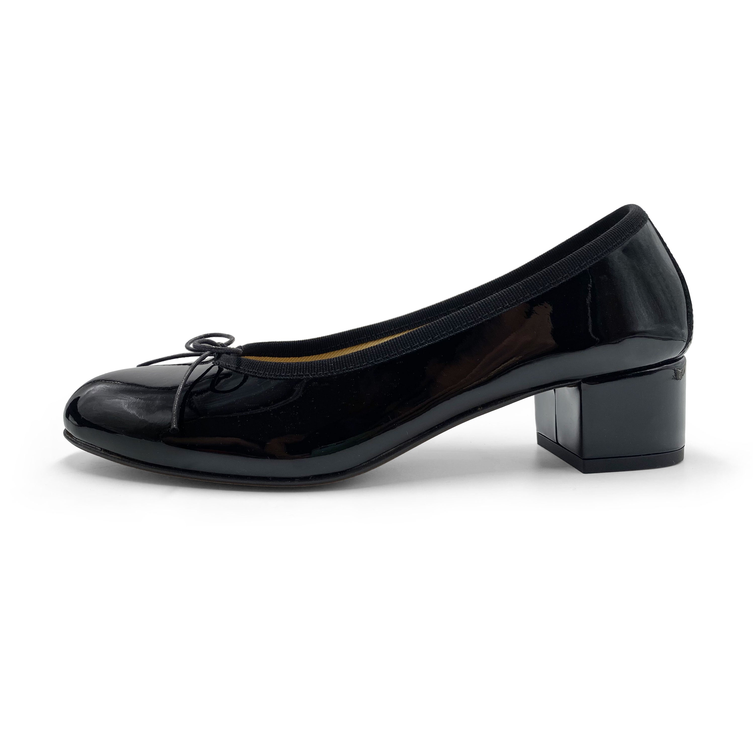 Black patent leather ballet flats with heel