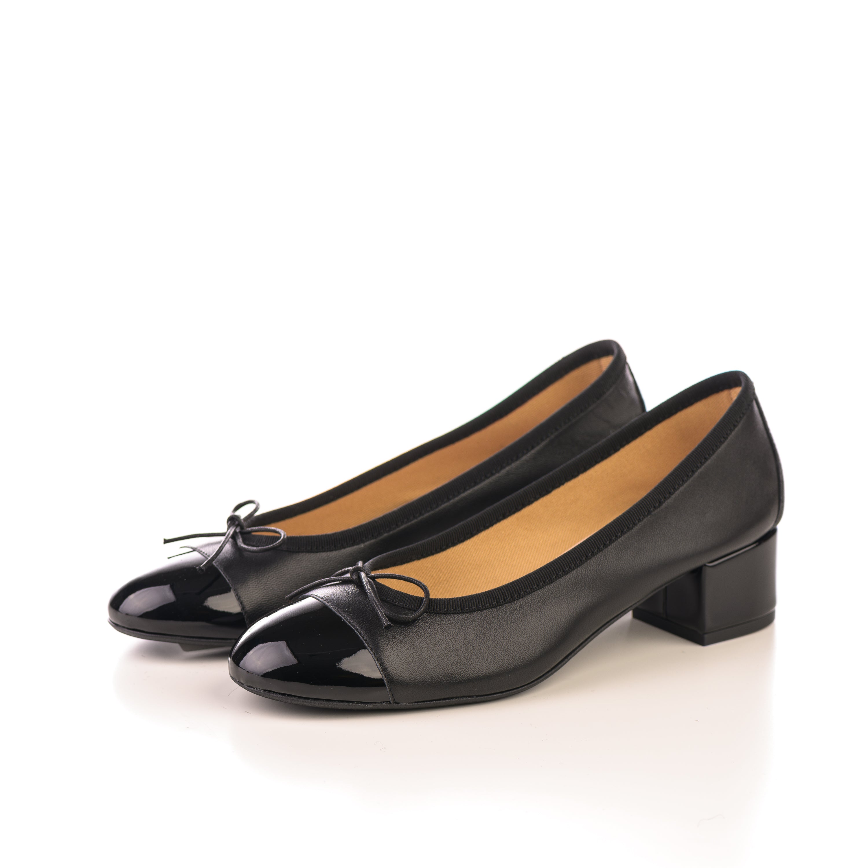 Black leather ballet flats with high heel and patent toe