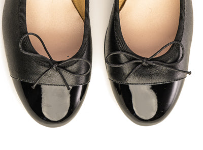 Black leather ballet flats with high heel and patent toe