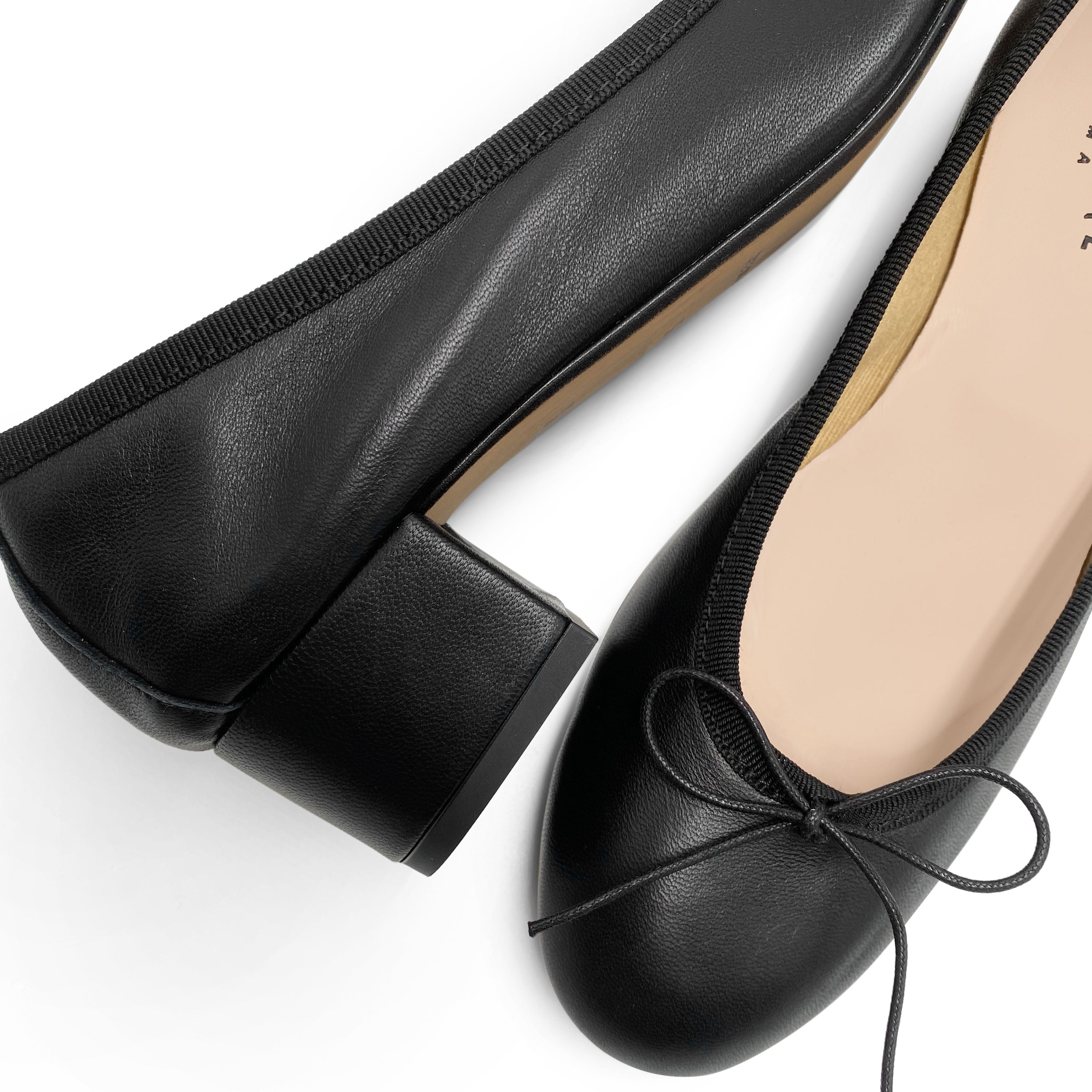 Black leather ballet flats with heel