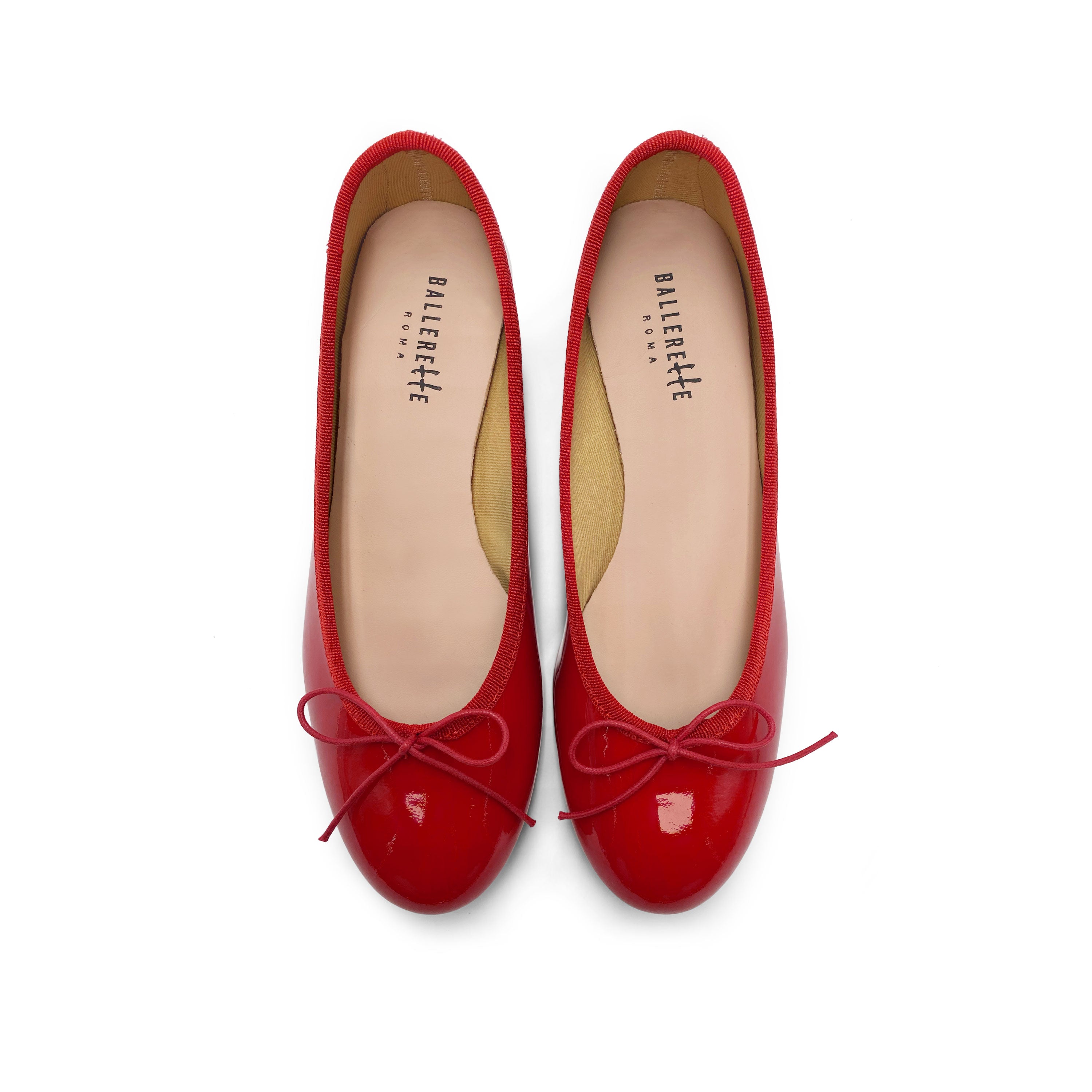 Red patent leather ballet flats with heel