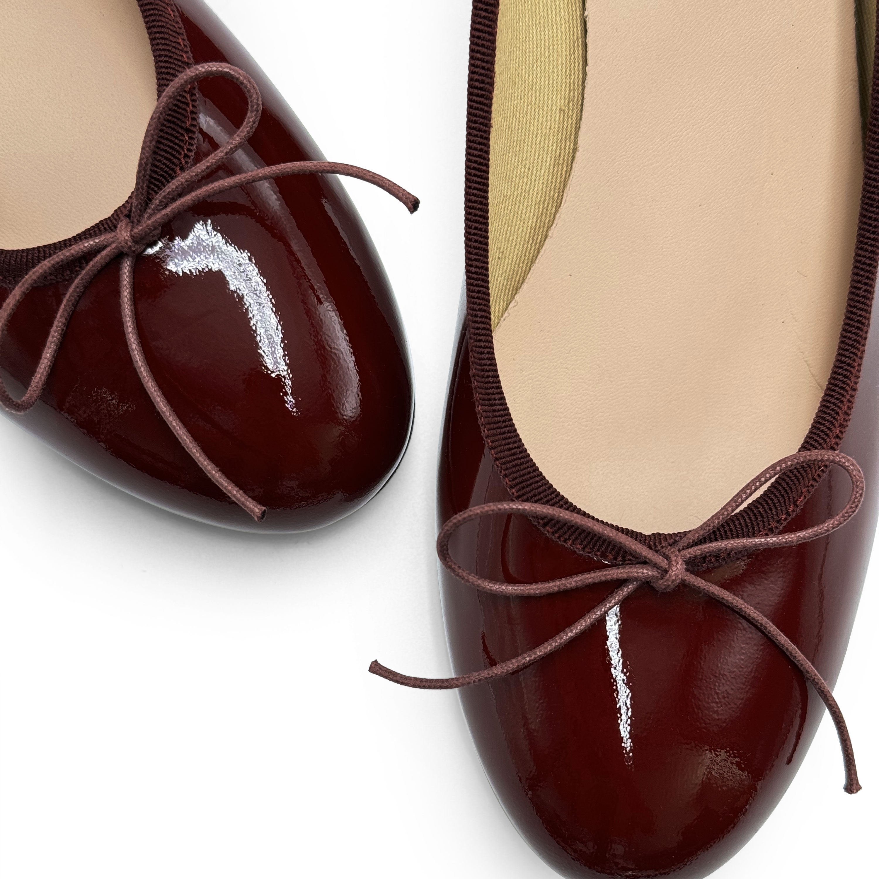 Burgundy patent leather ballet flats with heel