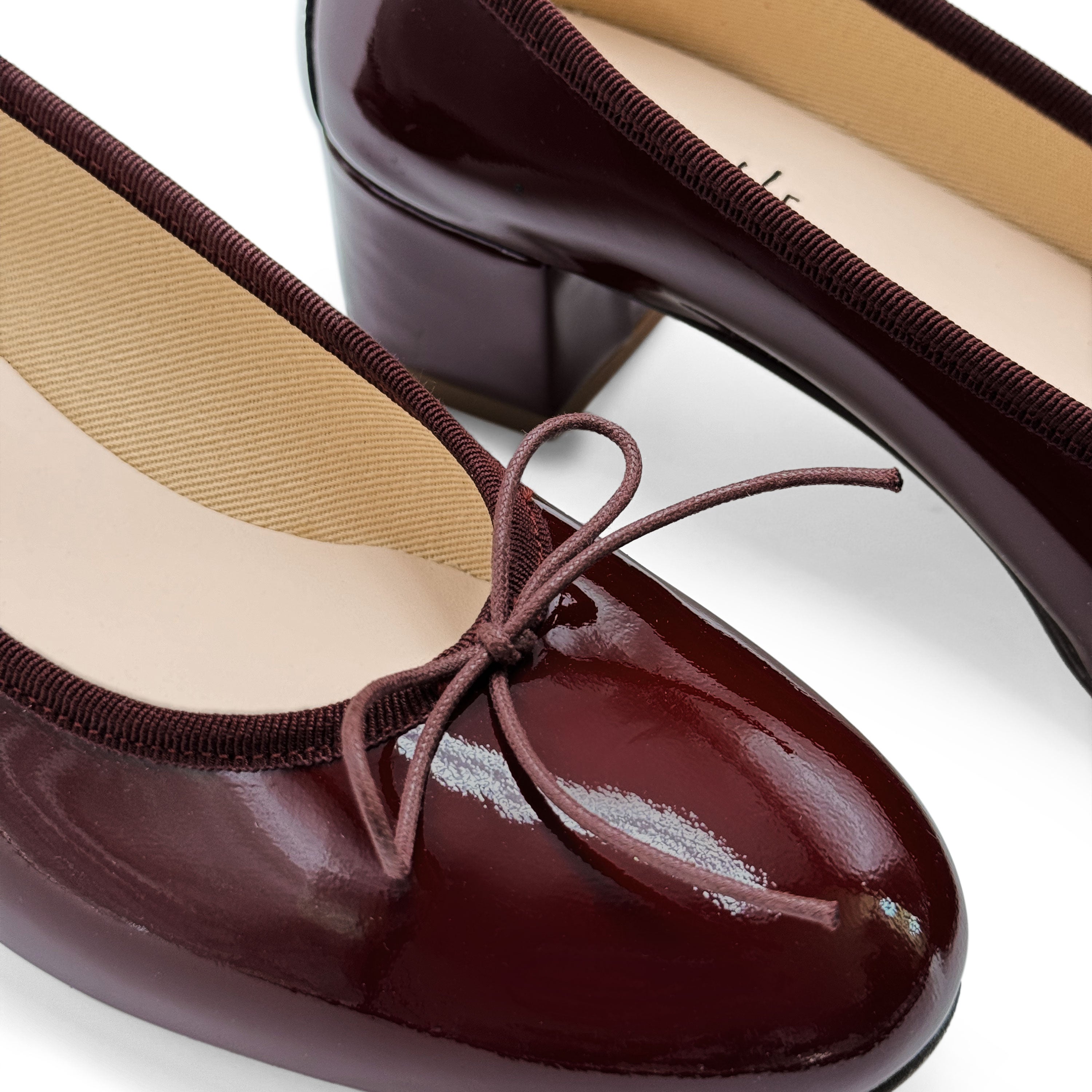 Burgundy patent leather ballet flats with heel