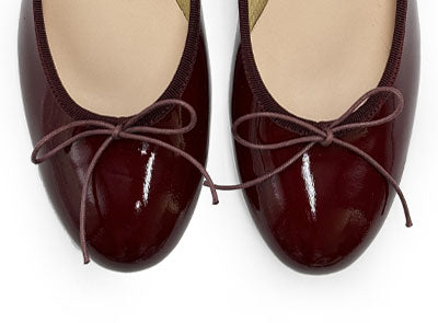 Burgundy patent leather ballet flats with heel