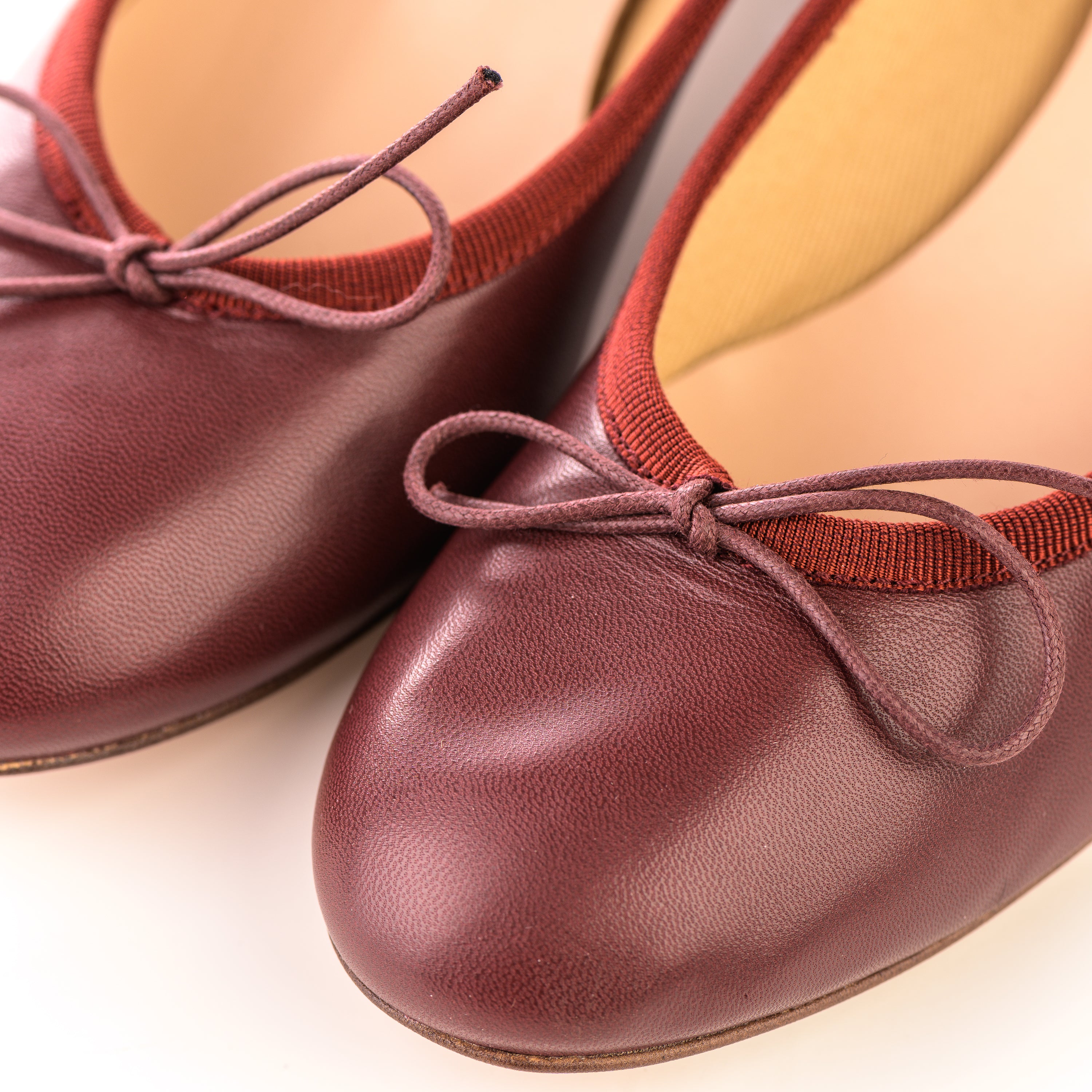 Burgundy leather ballet flats with heel