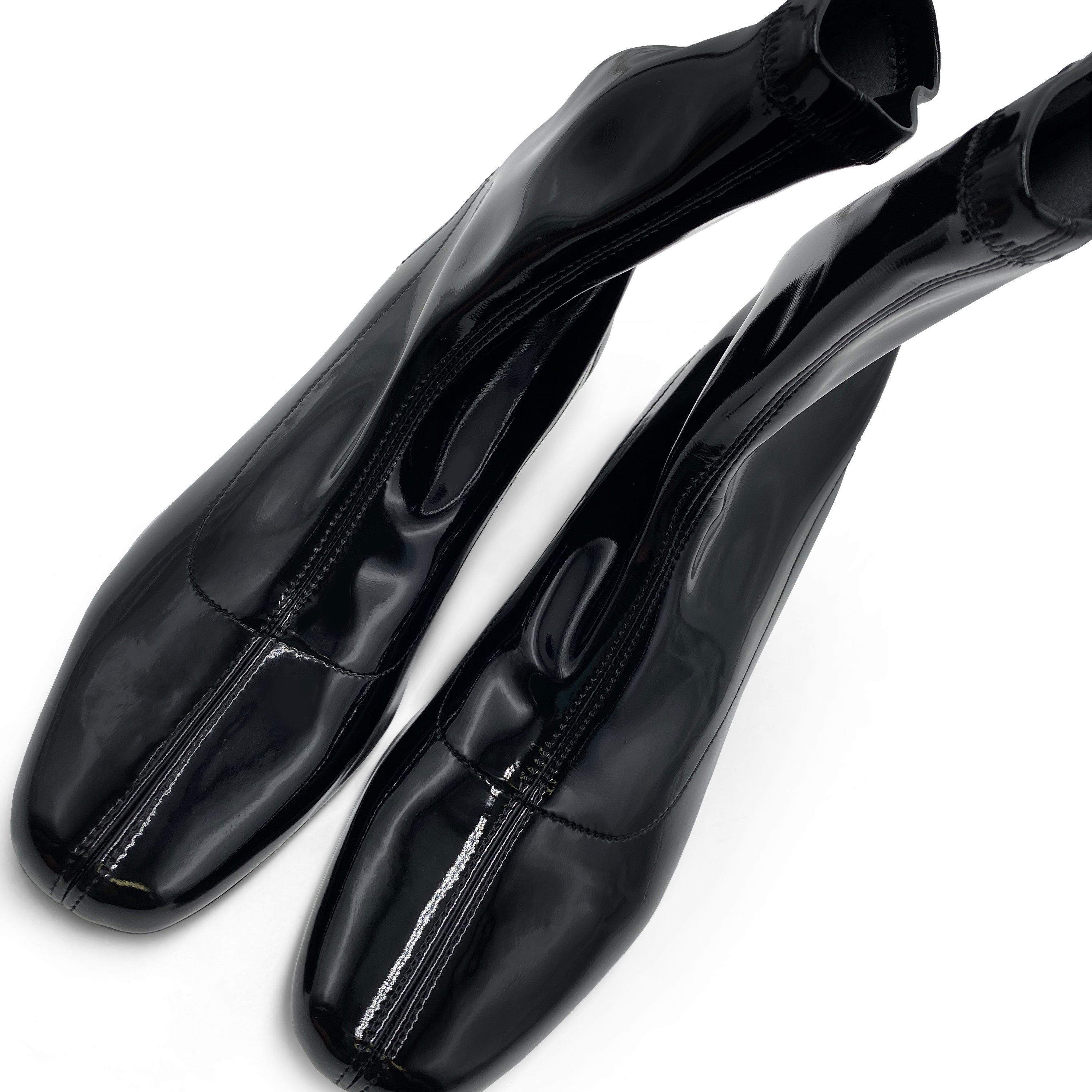 Black patent leather ankle boots with elasticated sock