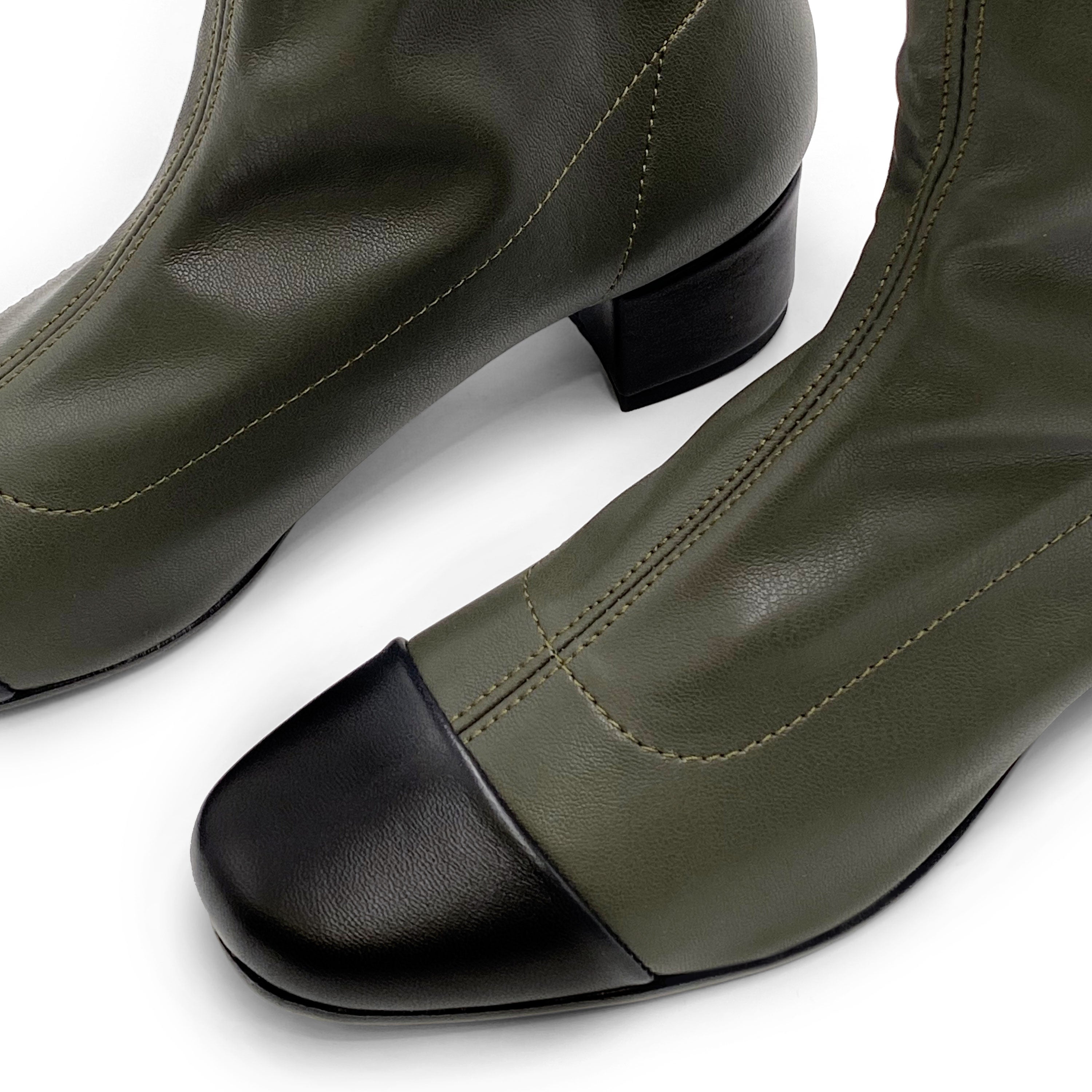 Green stretch ankle socks boots with black leather toe