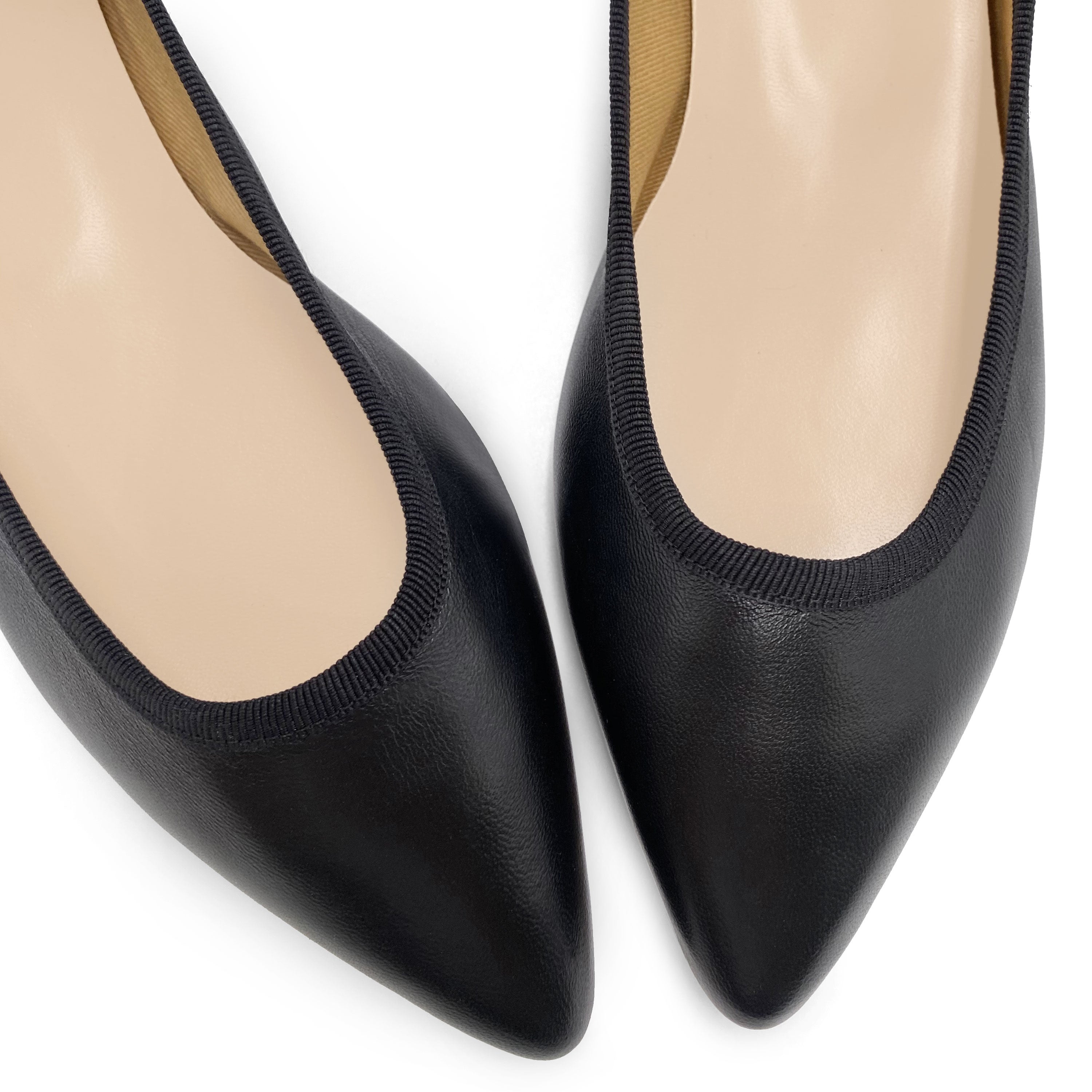 Pointed toe black leather ballet flats