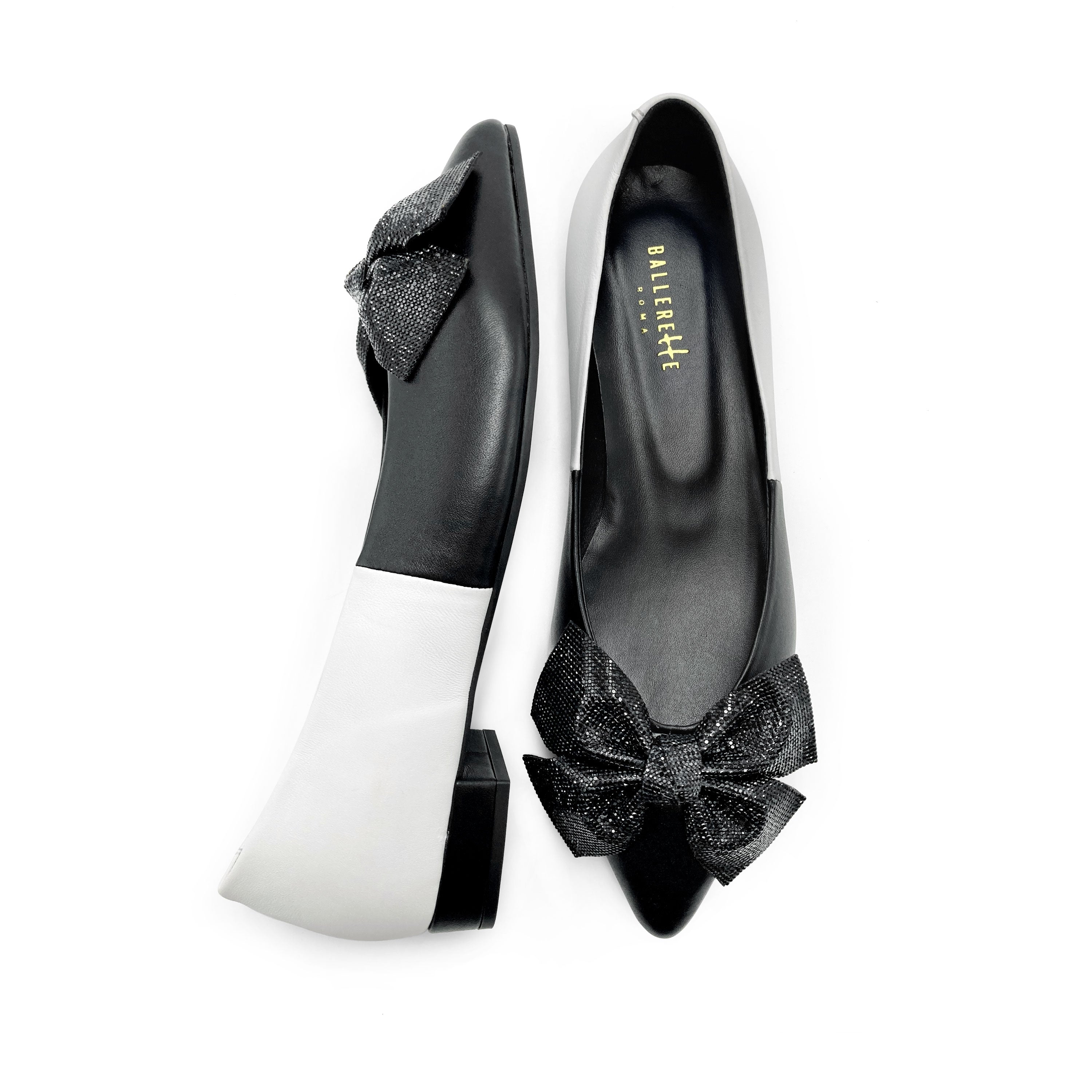 Black and white leather evening ballet flats with pointed toe and jewel bow