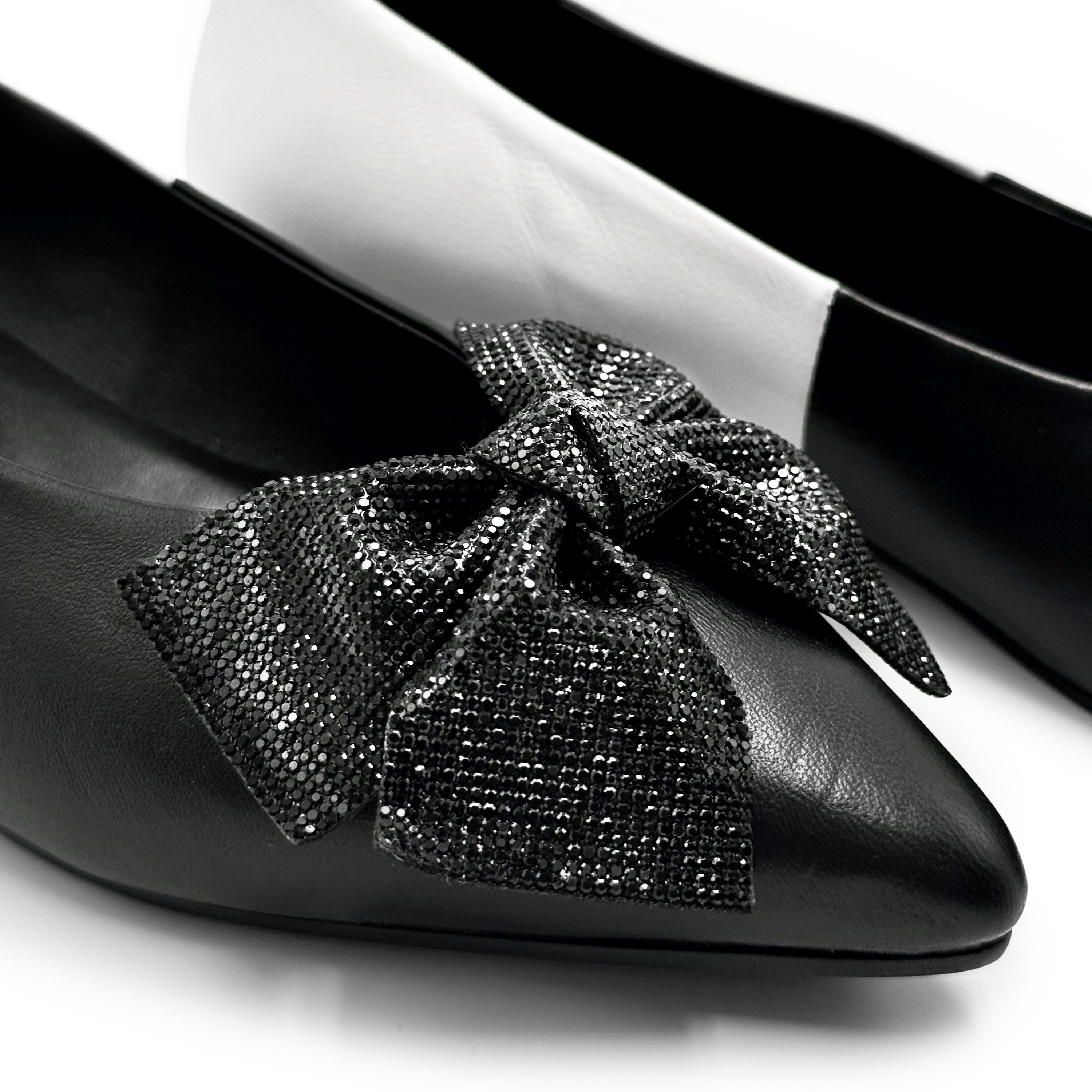 Black and white leather evening ballet flats with pointed toe and jewel bow