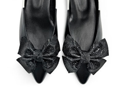 Black and white leather evening ballet flats with pointed toe and jewel bow