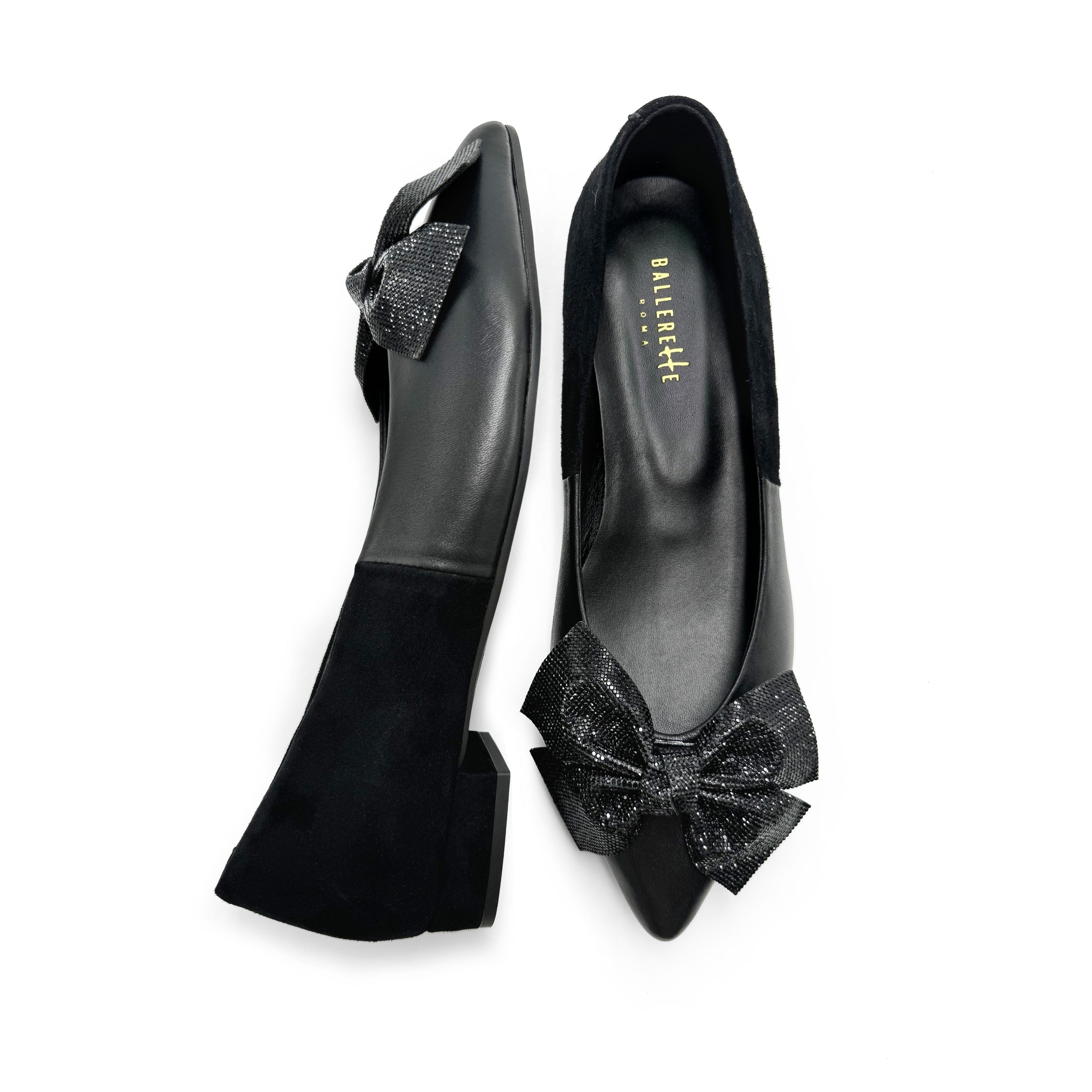 Black leather evening ballet flats with pointed toe and jewel bow