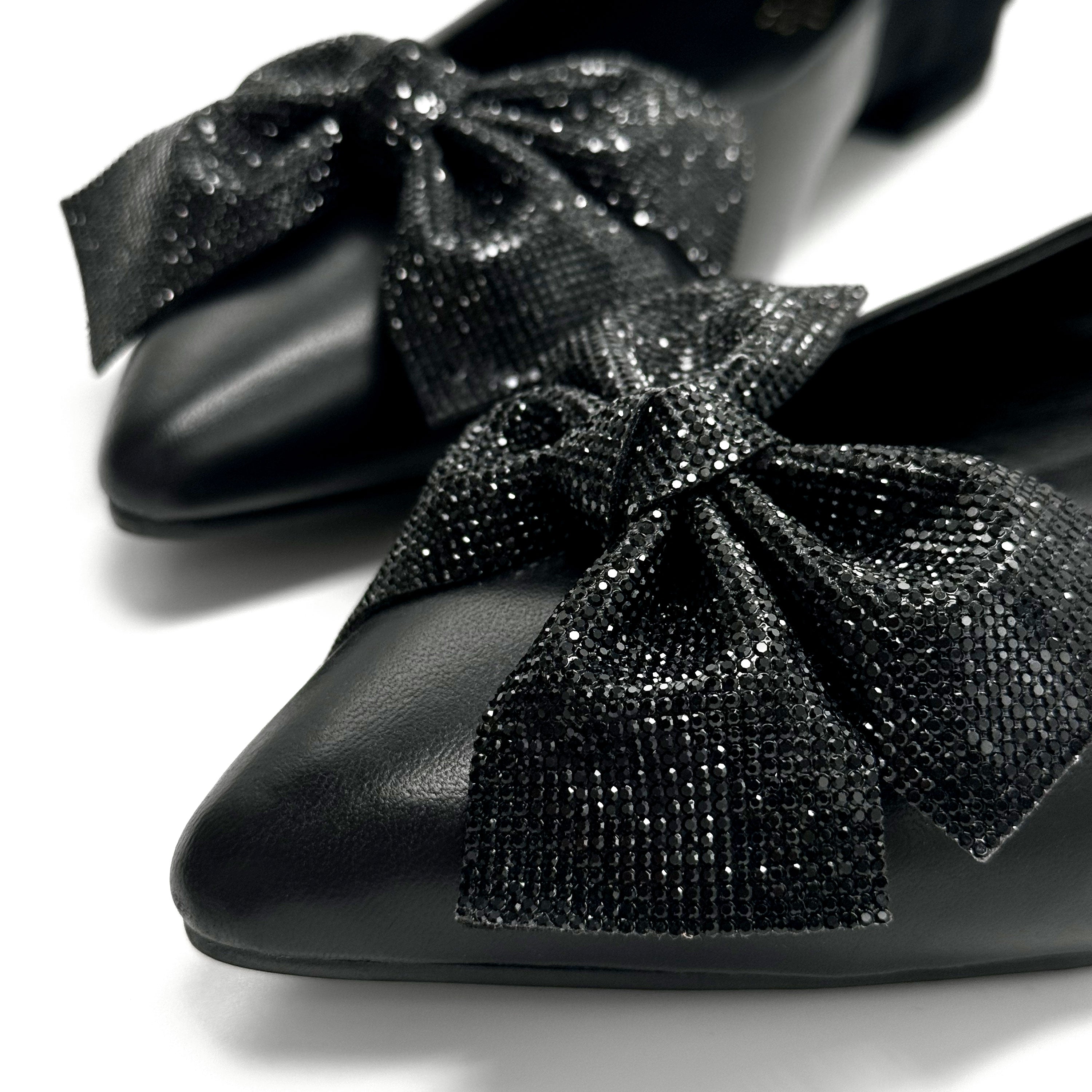 Black leather evening ballet flats with pointed toe and jewel bow