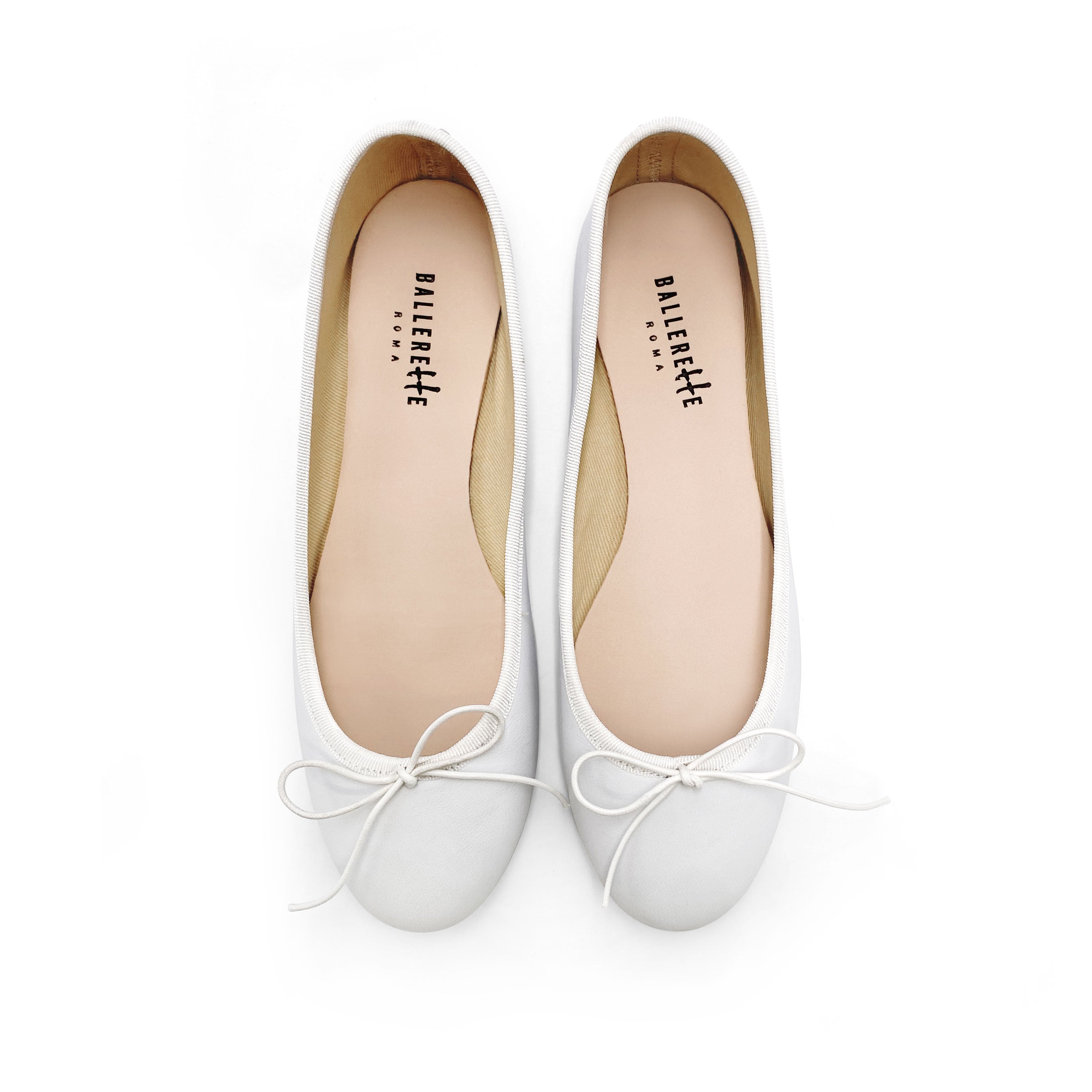 White leather ballet flats