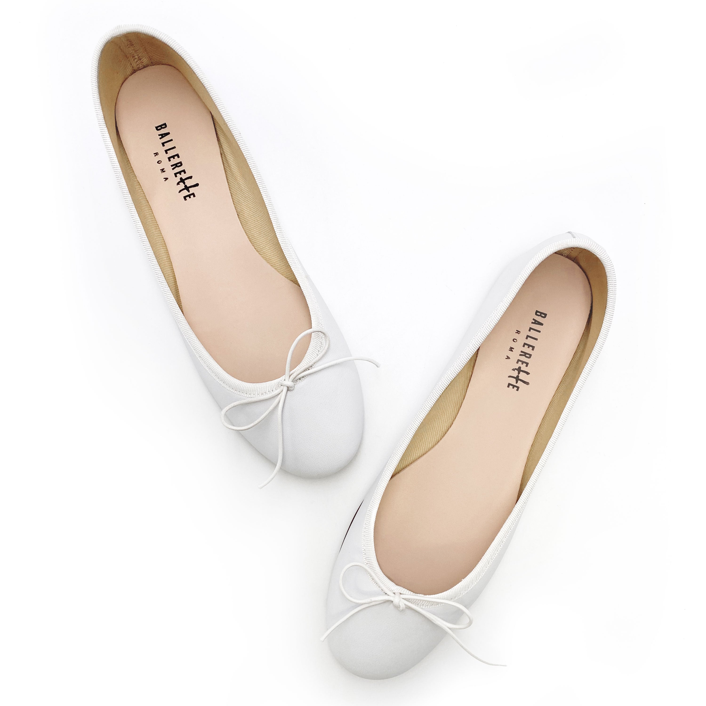 White leather ballet flats