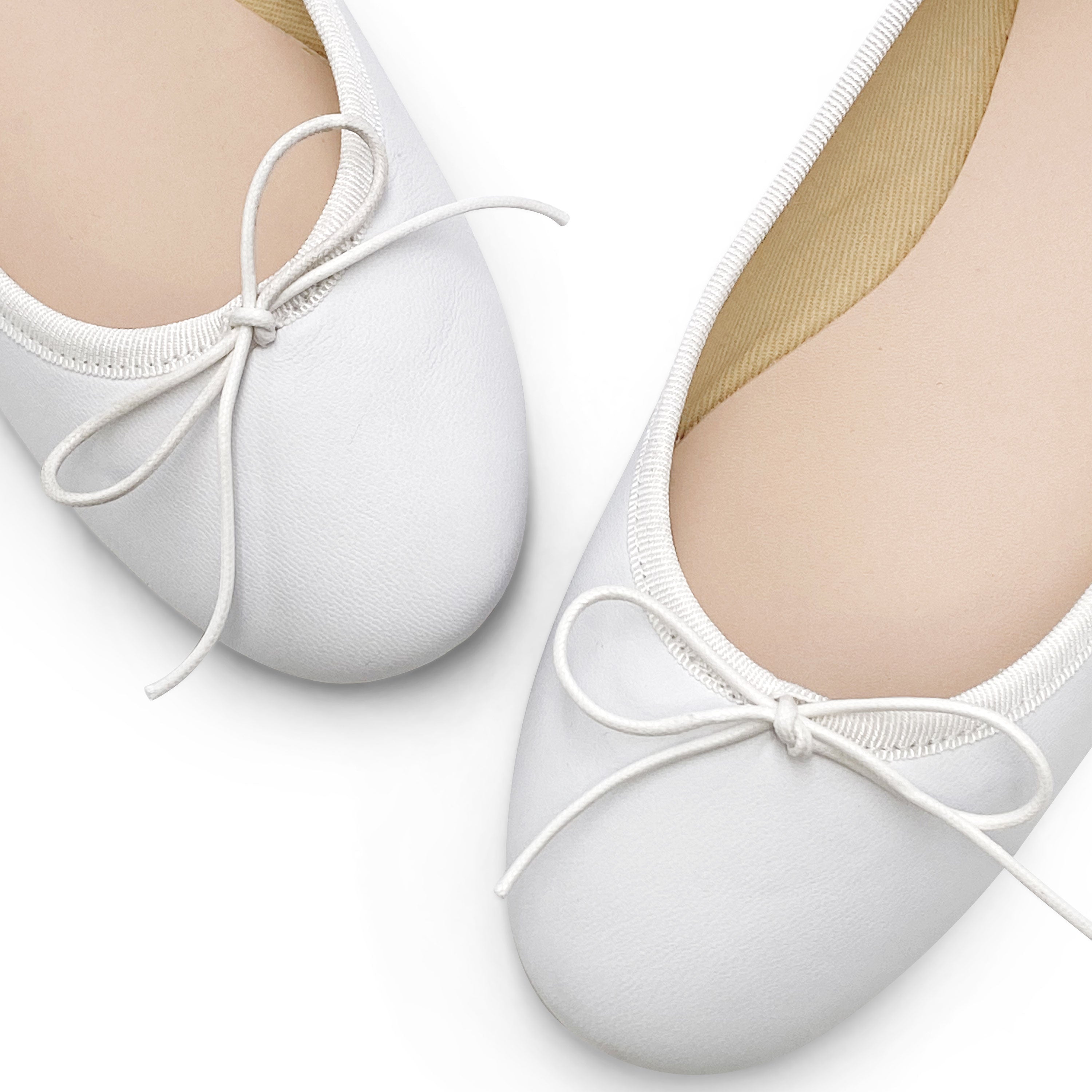 White leather ballet flats