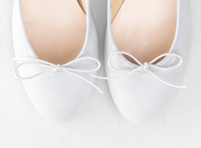 White leather ballet flats