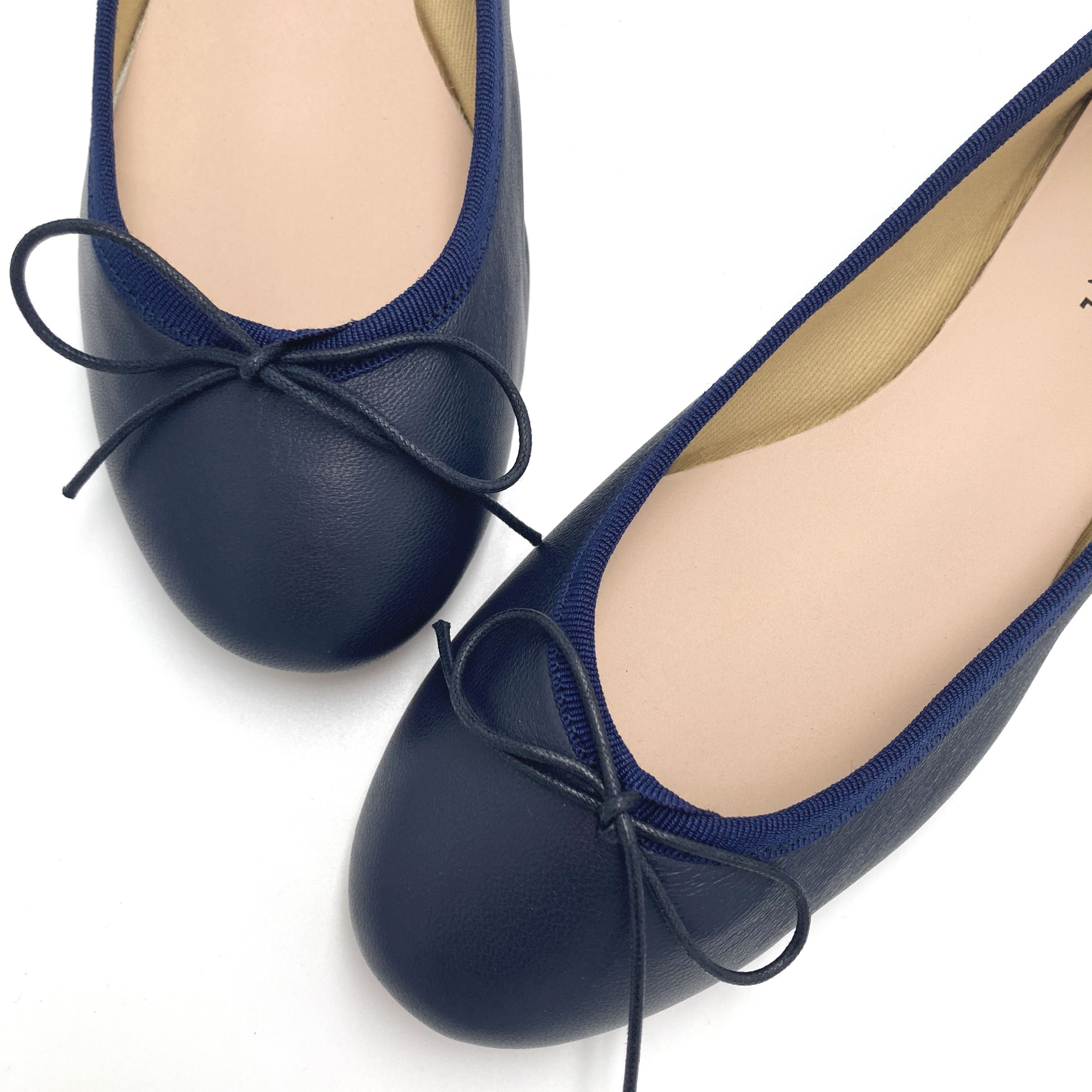 Navy blue leather ballet flats