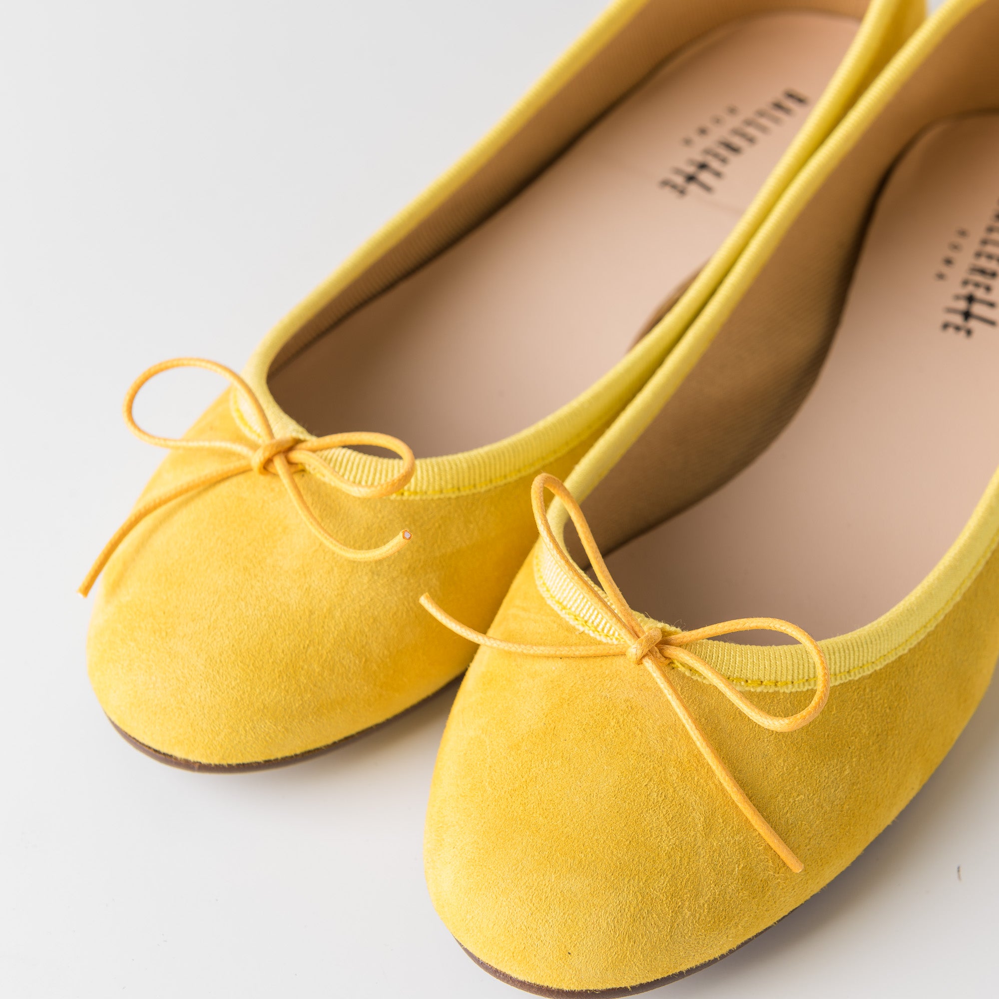 Yellow suede ballet flats