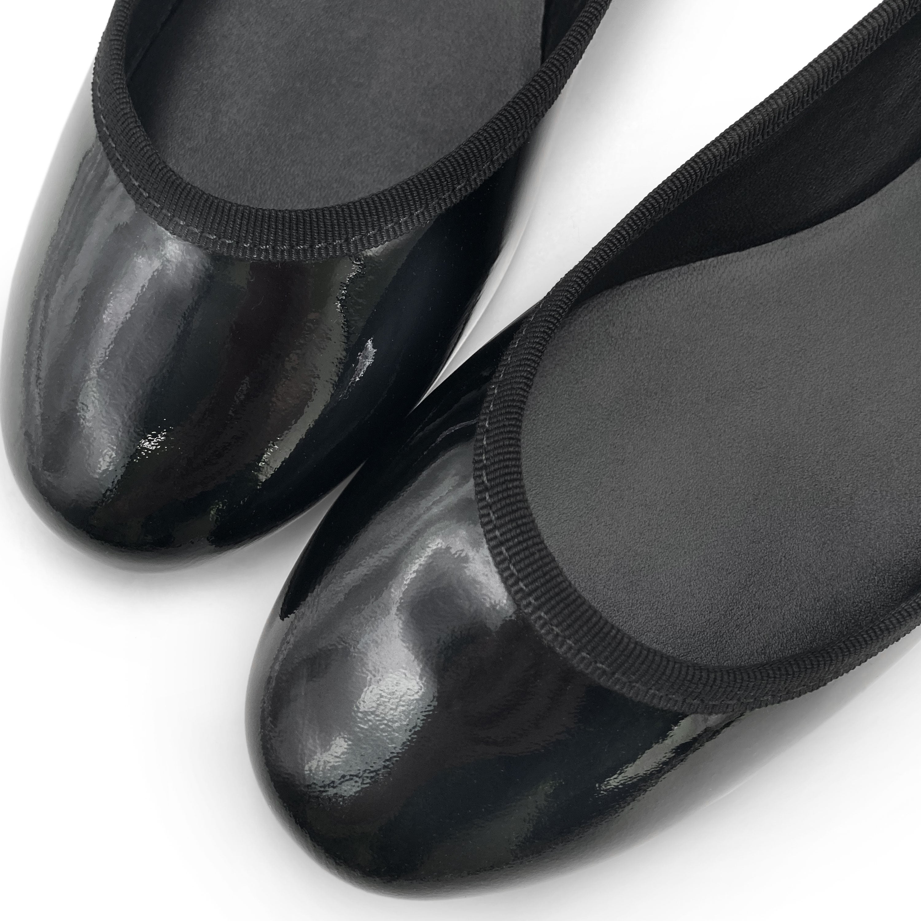 Black patent leather ballet flats with jewelled strap