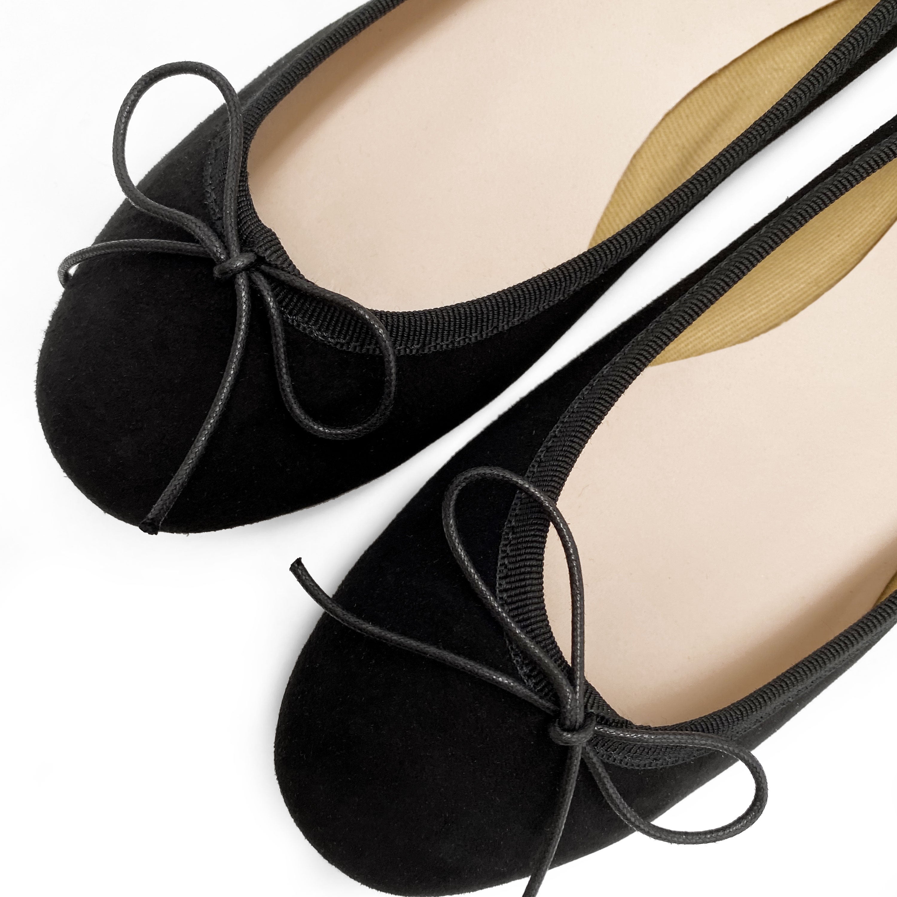 Black suede ballet flats