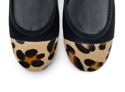 Black suede ballet flats with animal print toe