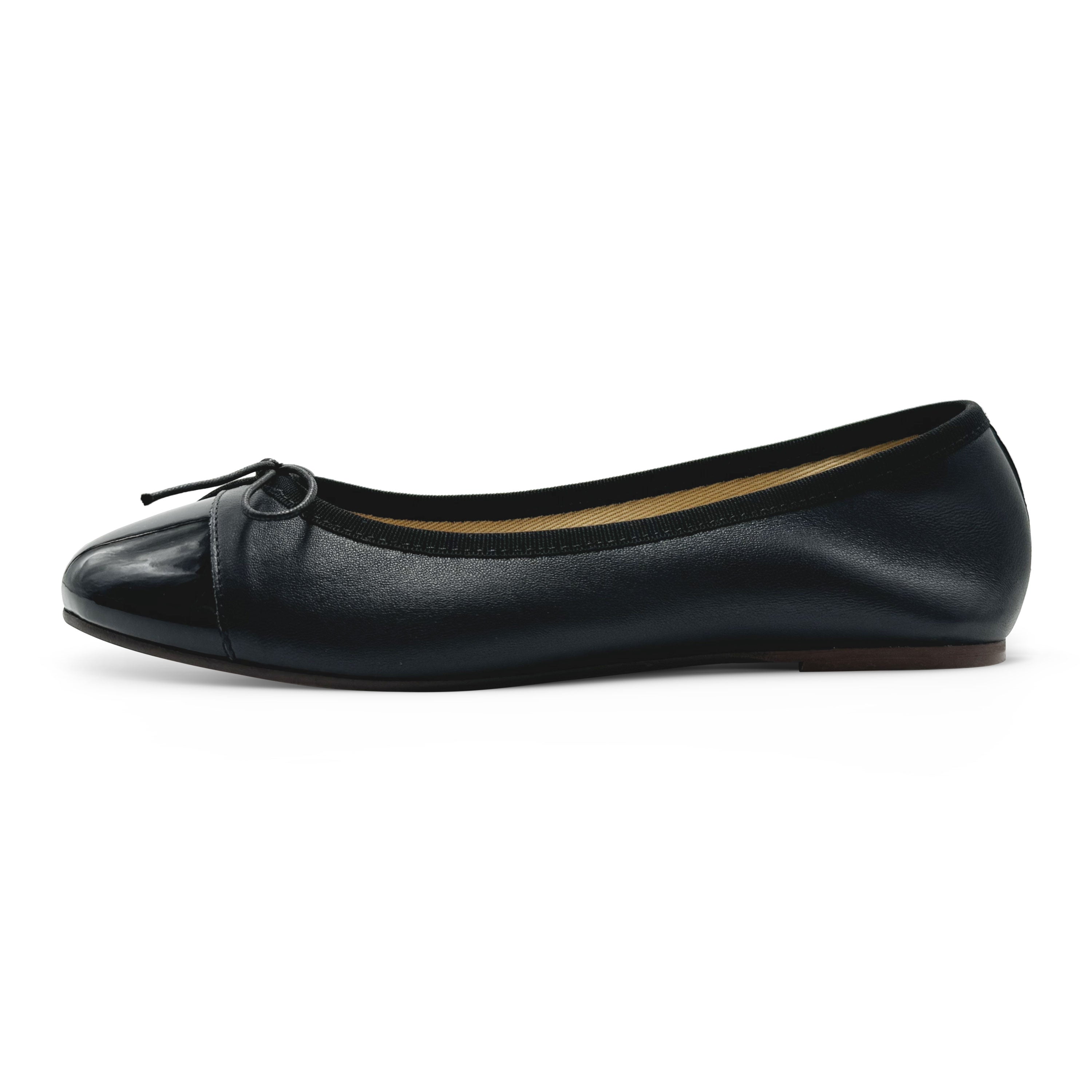 Black leather ballet flats with black patent toe